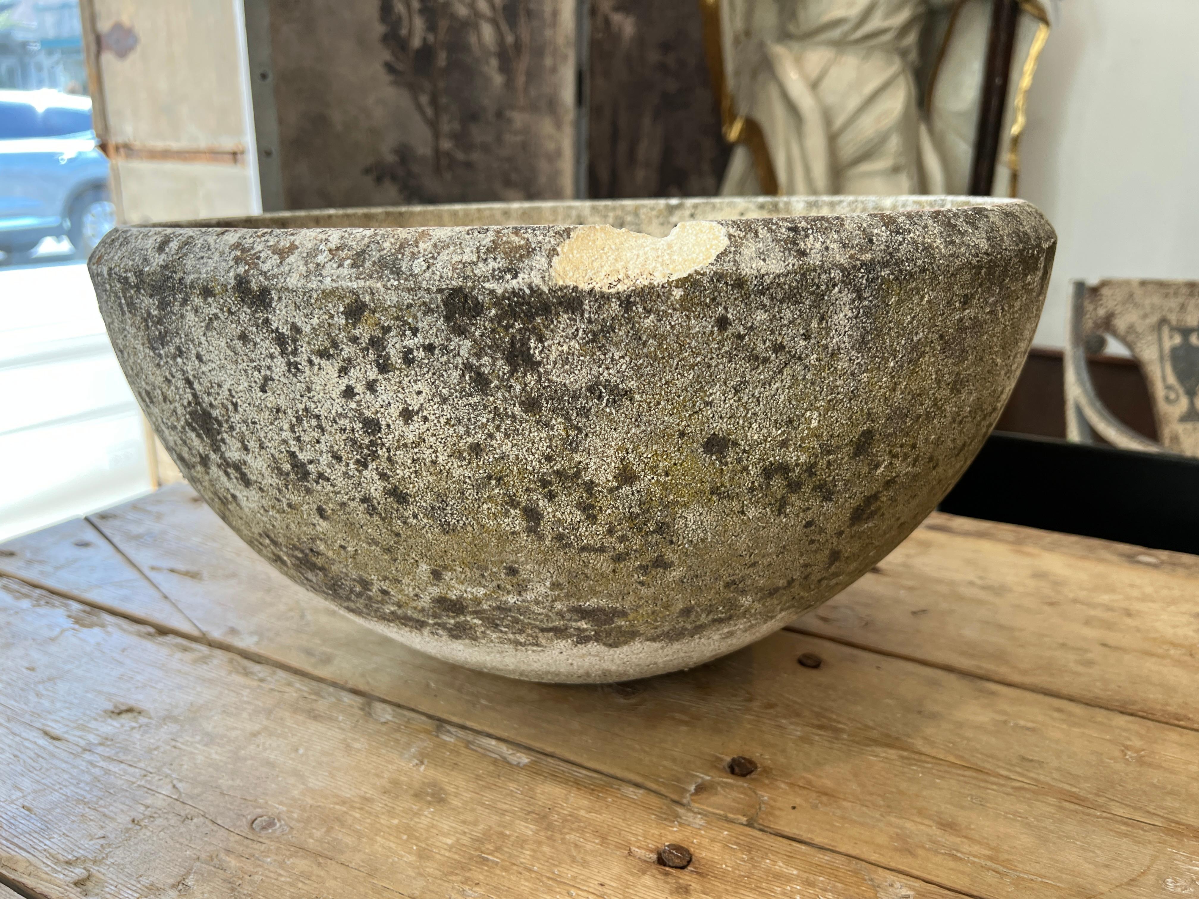Perfect proportions in a simple round vessel.  Arranged in multiples or singly, the  statement is strong. beautiful patina inside and out.