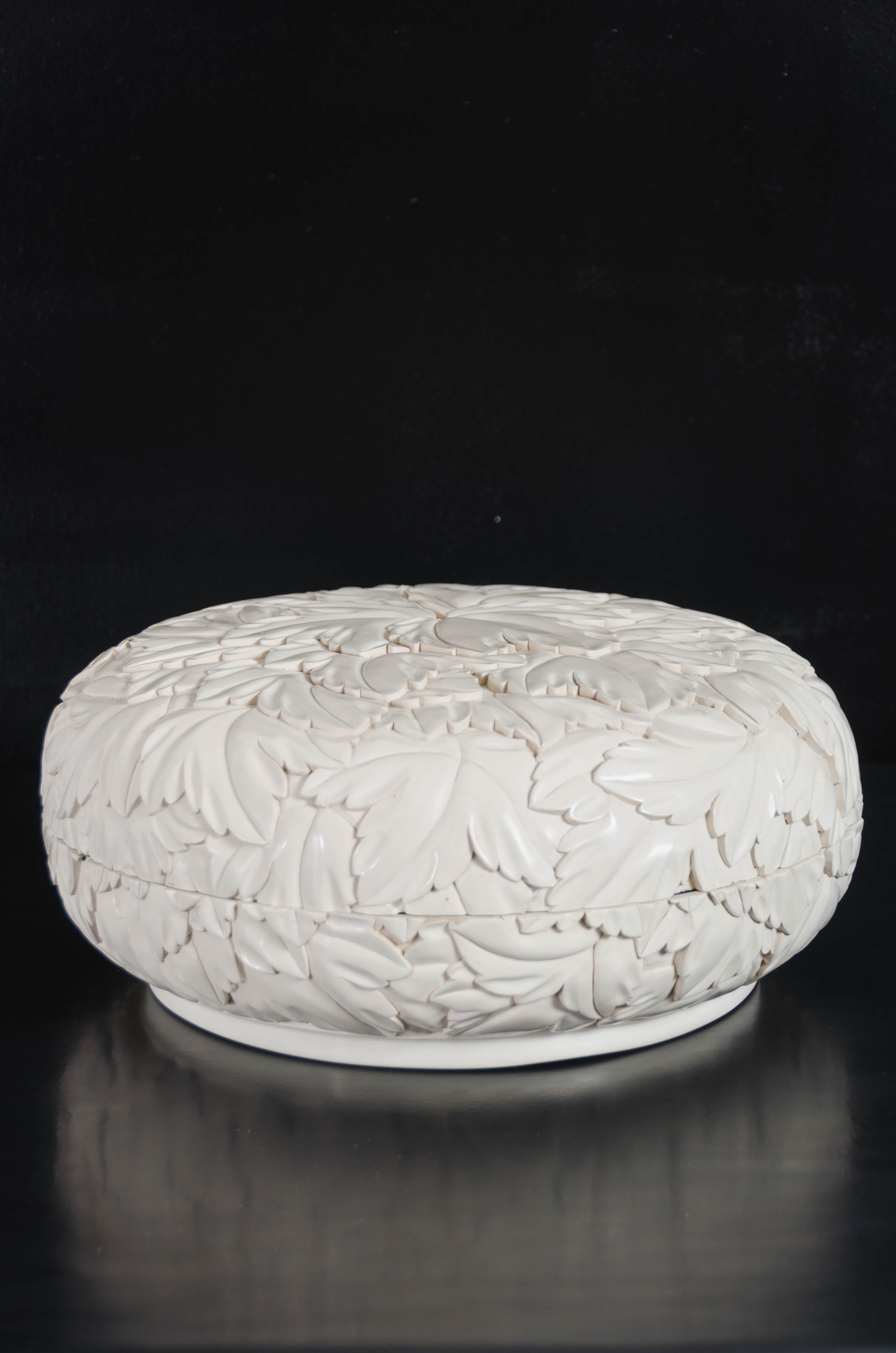 Round leaf design box
Cream lacquer
Hand-carved
Wood base
Limited edition
In stock

Lacquer is a technique that dates back to the Shang dynasty, circa 1600-1100 B.C. These pieces are made with at least 60 coats of organic lacquer. Each layer of