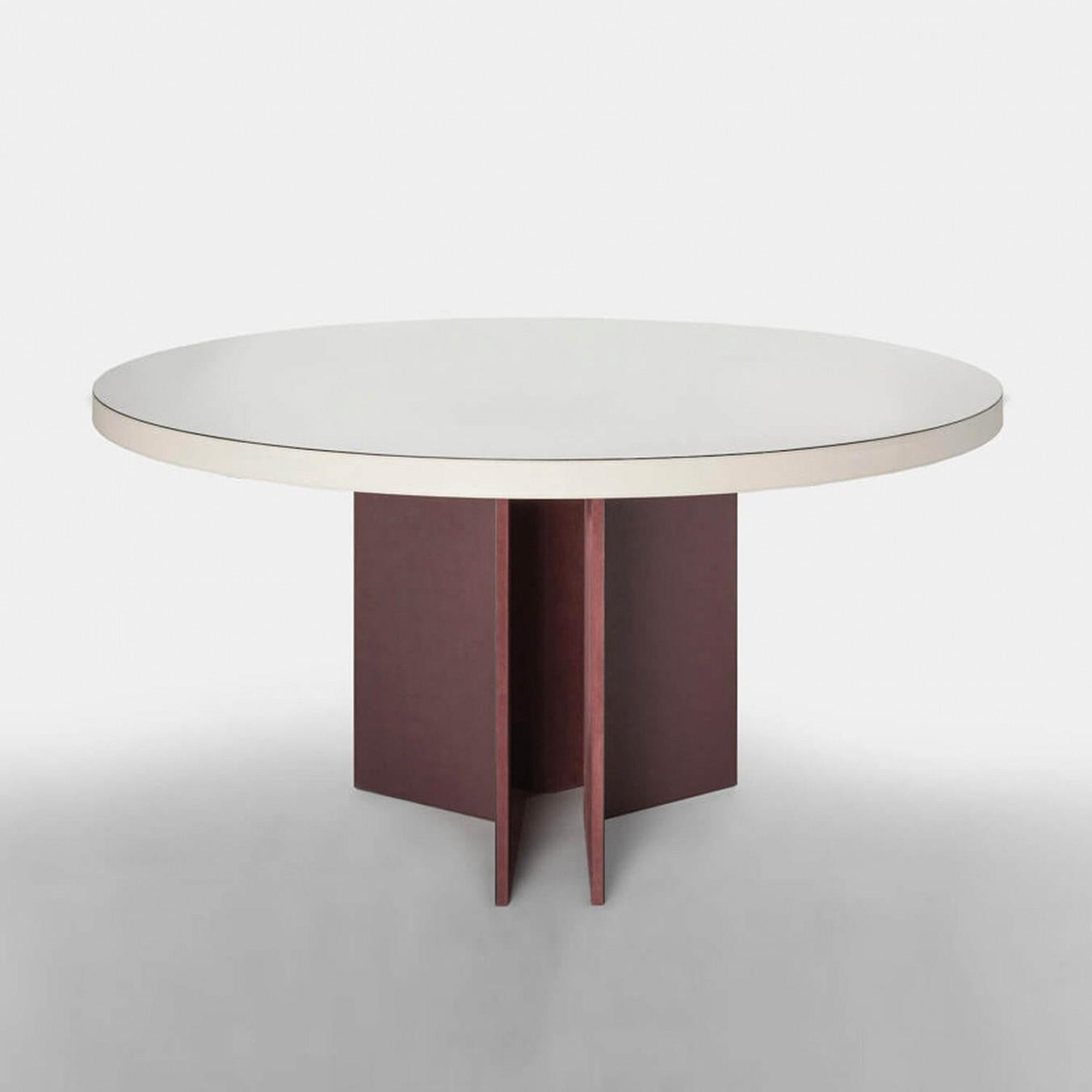 Contemporary round leather dining table - Bivio by Stephane Parmentier for Giobagnara.
The object presented in the image has following finish: A05 White Suede Leather and A17 Bordeaux Suede Leather.

A superb expression of creativity and