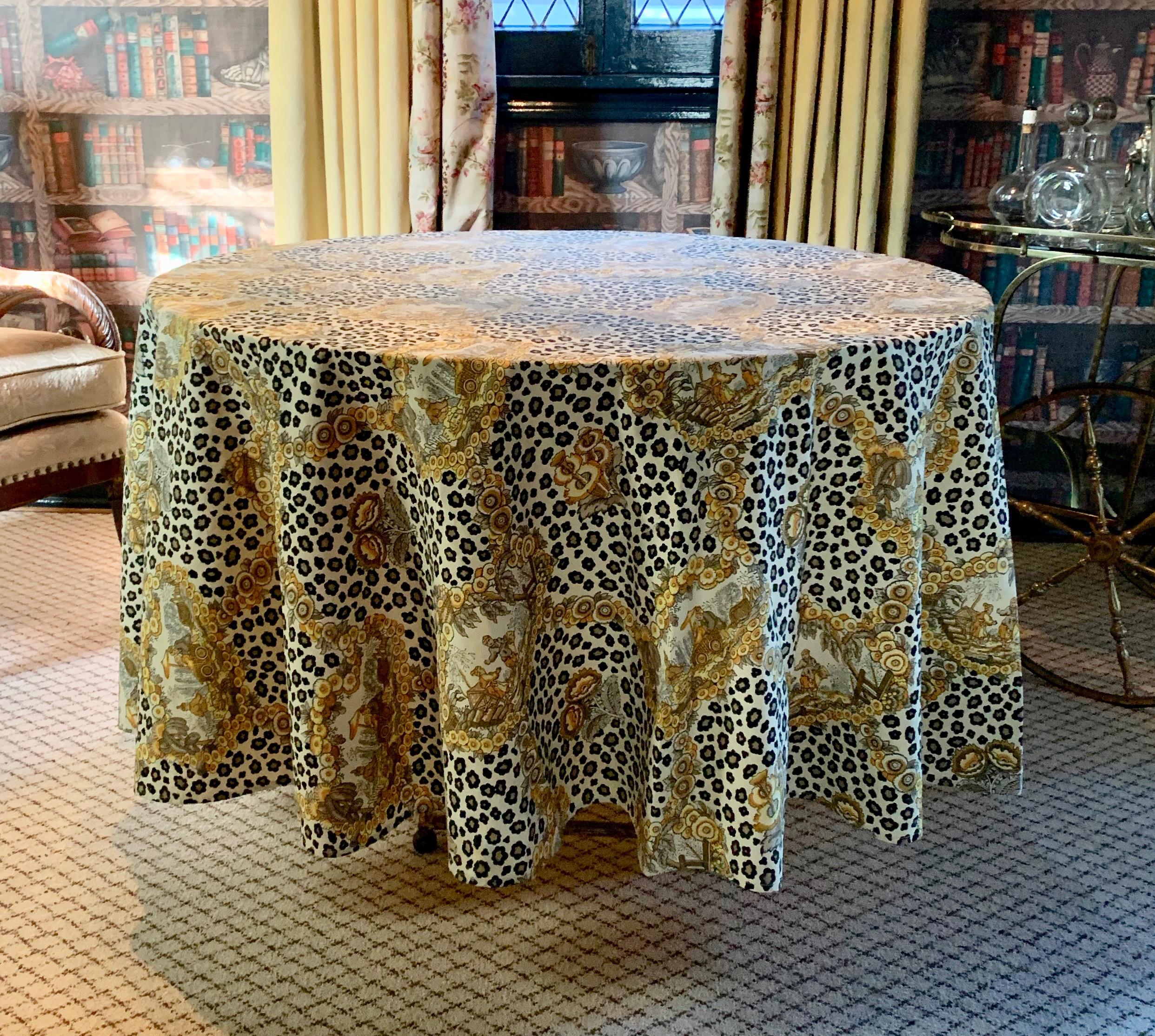 Stunning leopard and chinoiserie table cloth - a handsome statement in style, starting the conversation before the first drink, this cloth is the appetizer.

Crossing over two styles of bold leopard with Chinese motifs - it doesn't get better for