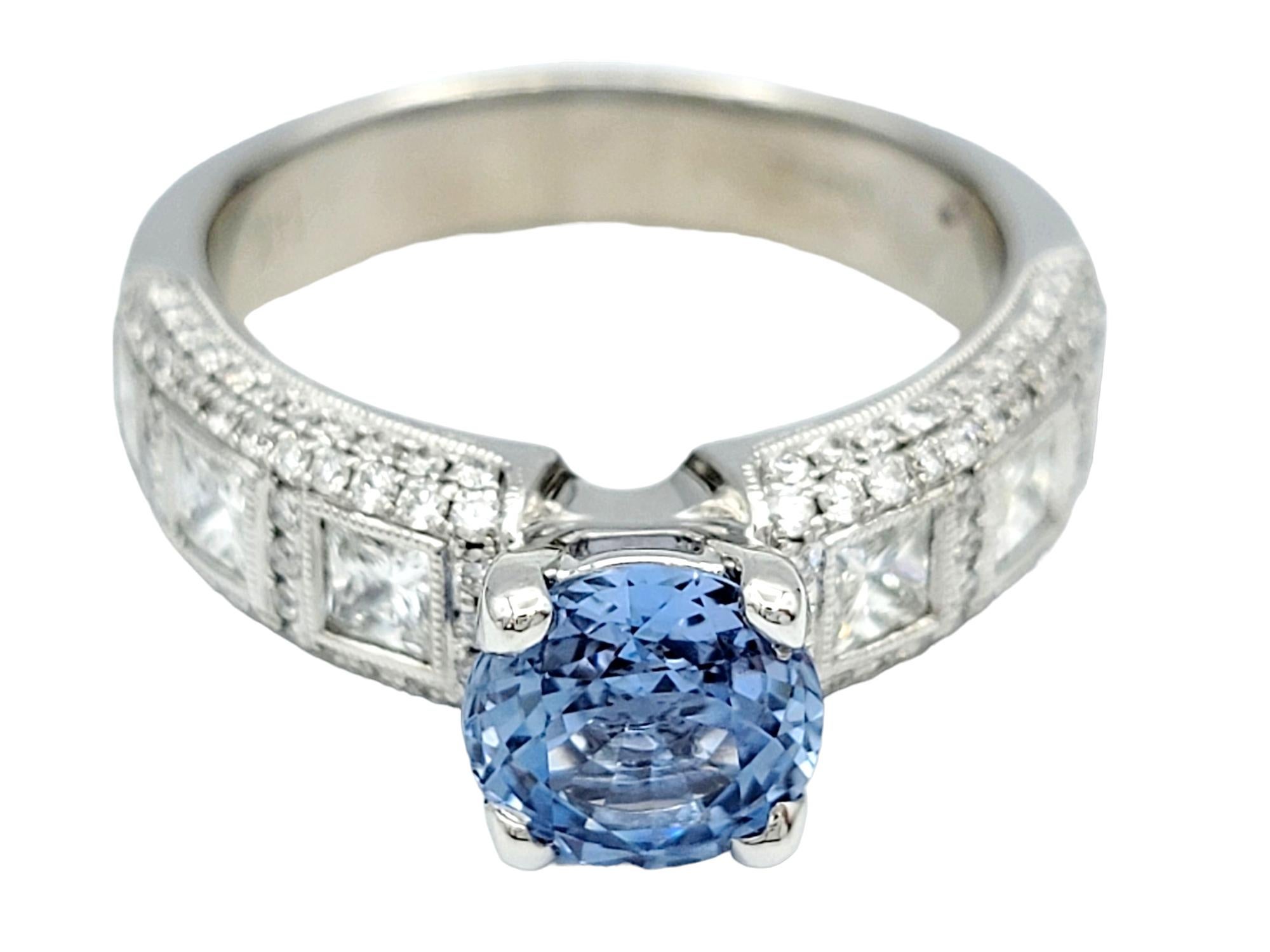 Contemporary Round Light Blue Sapphire Solitaire Ring with Diamond Band 14 Karat White Gold For Sale