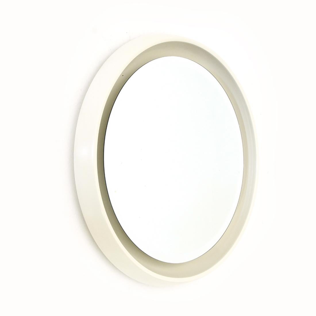 Mirror of Italian manufacture produced in the 1960s by CRB.
Structure and frame in white lacquered wood.
Round mirror with beveled edge.
Illumination with circular neon.
Good general condition, some signs due to normal use over