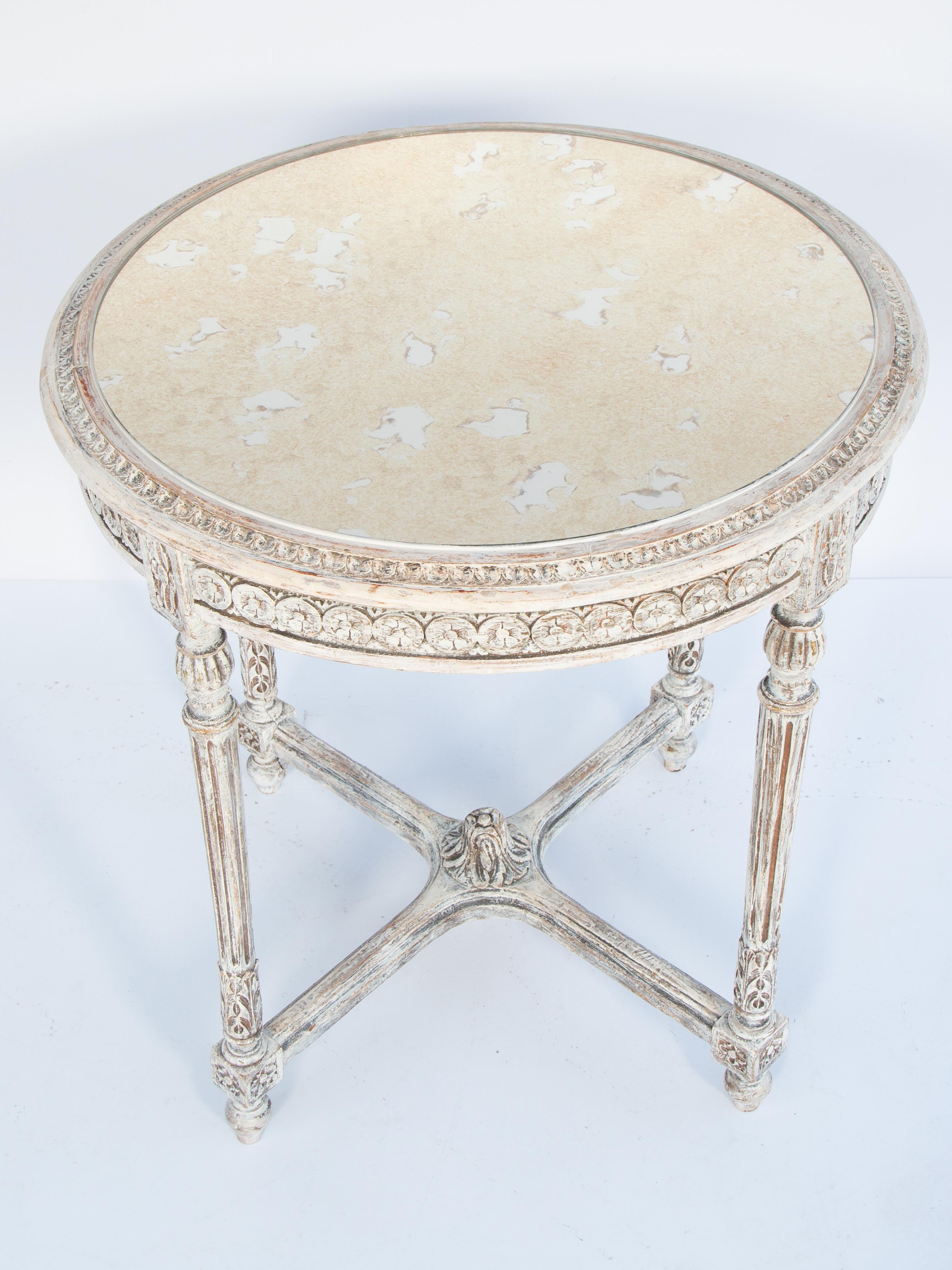 Hand-Carved Round Louis XVI-style Painted Occasional Table with Mirrored Top For Sale