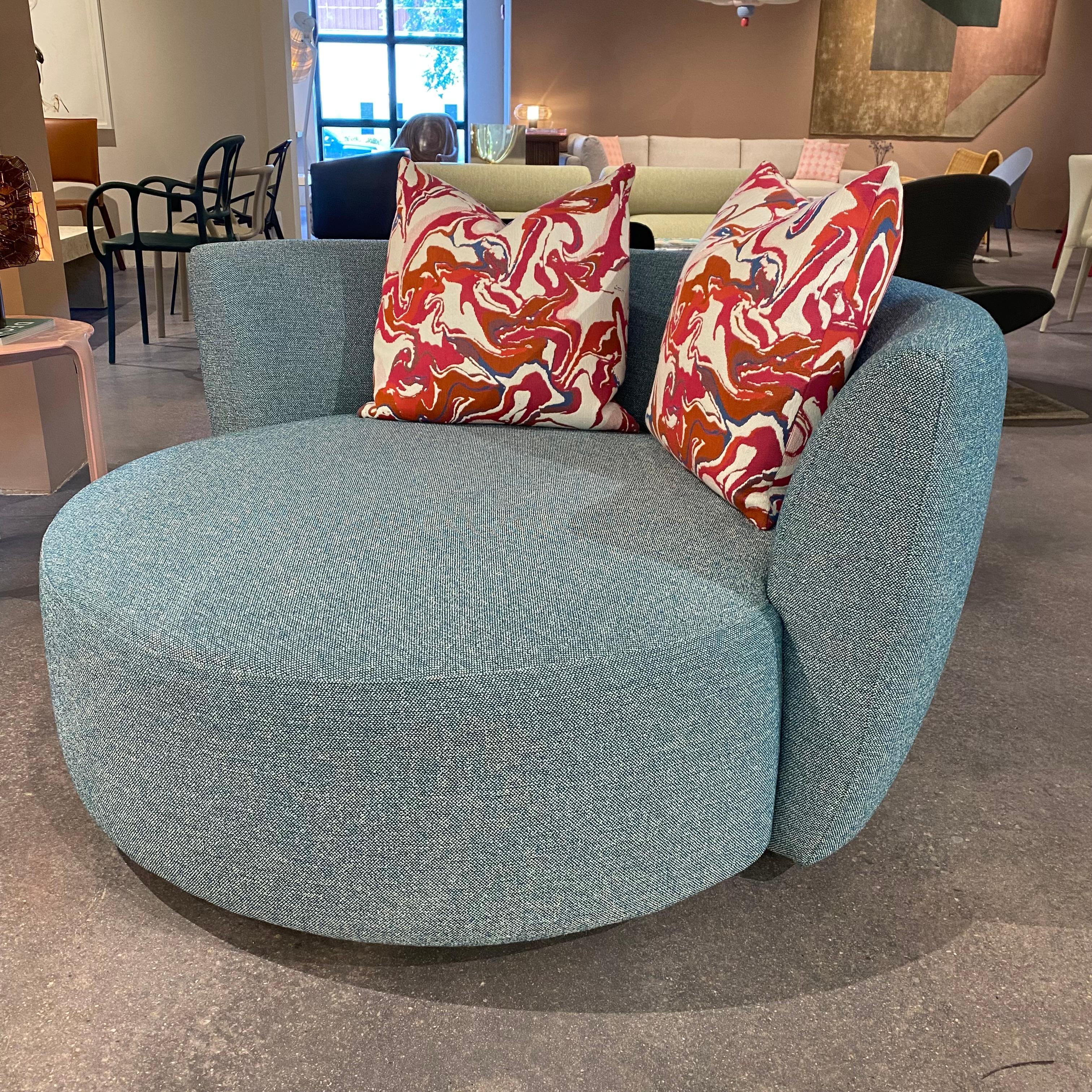 Beautiful upholstered chair from California manufacturer Della Robbia.  Wide and made for lounging.  This is a floor sample from our showroom but is in near perfect condition.  Originally $5788 now marked down to $2900