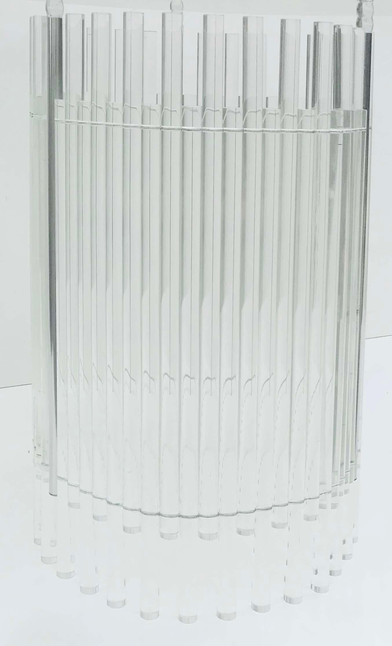 Superb Lucite and glass dining room table , drum base made of Lucite rods, thick glass top 
sturdy and elegant.

Diameter foot: 20 