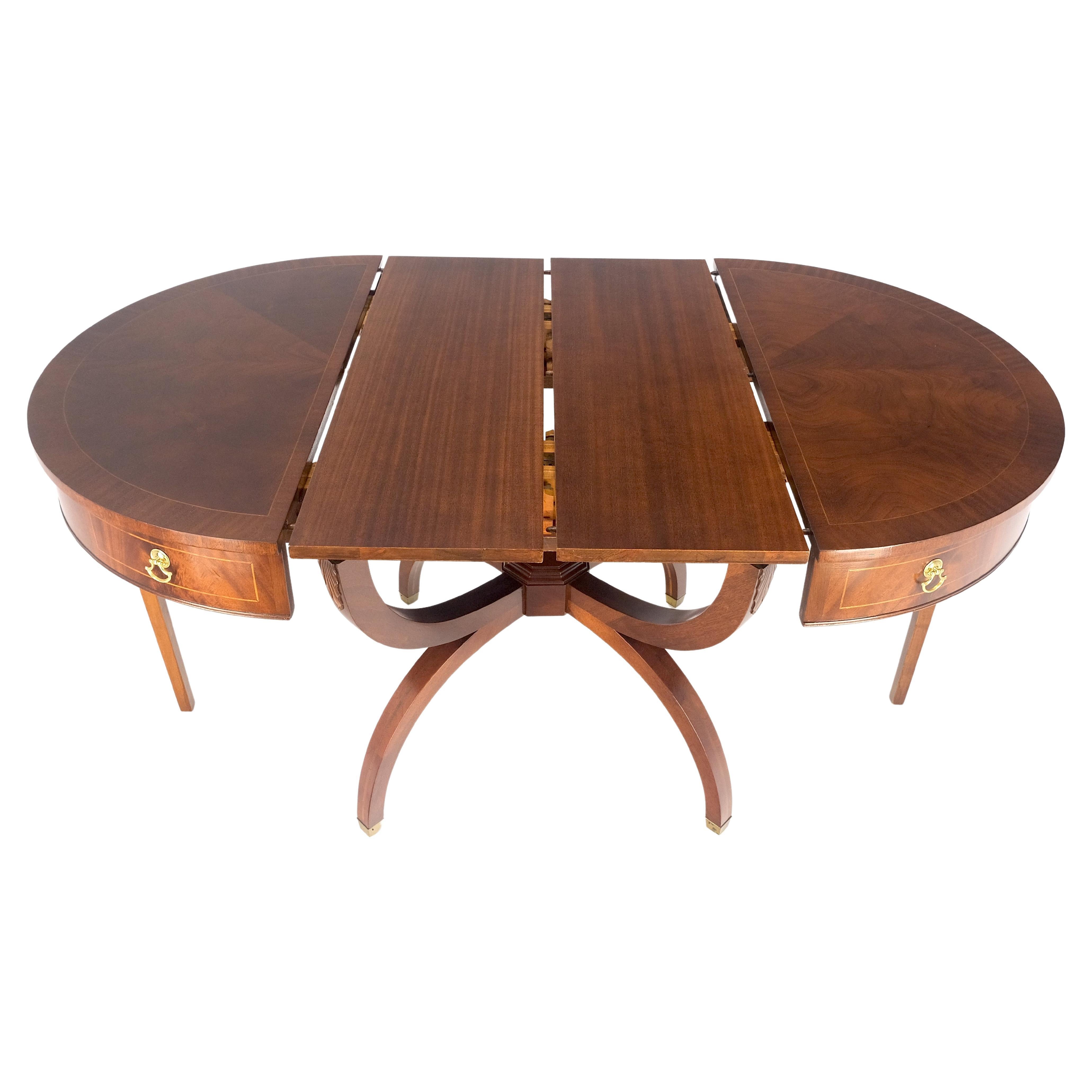 Round Mahogany Single Pedestal Drum Center Opens to Compact Dining Table w/ 2 Extension Boards Mint 
2 leaves 12in x 36in each with an extended table length of 60in