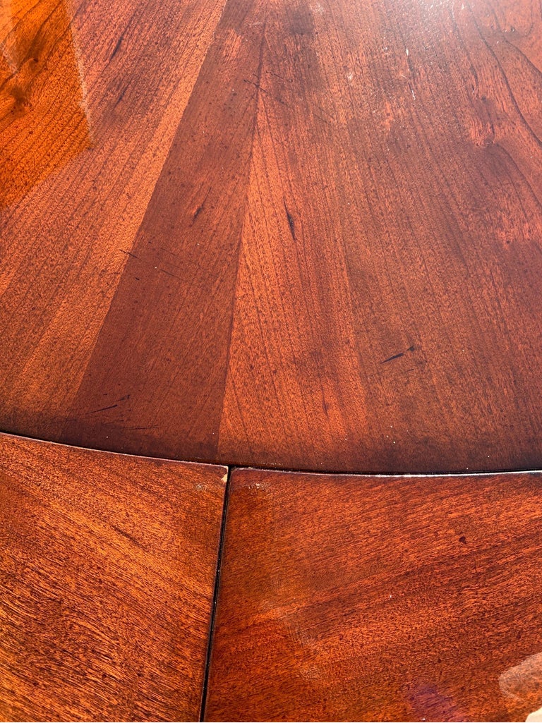 Round Mahogany Solid Wood Pedestal Dining Table with Perimeter Leaves For Sale at 1stDibs
