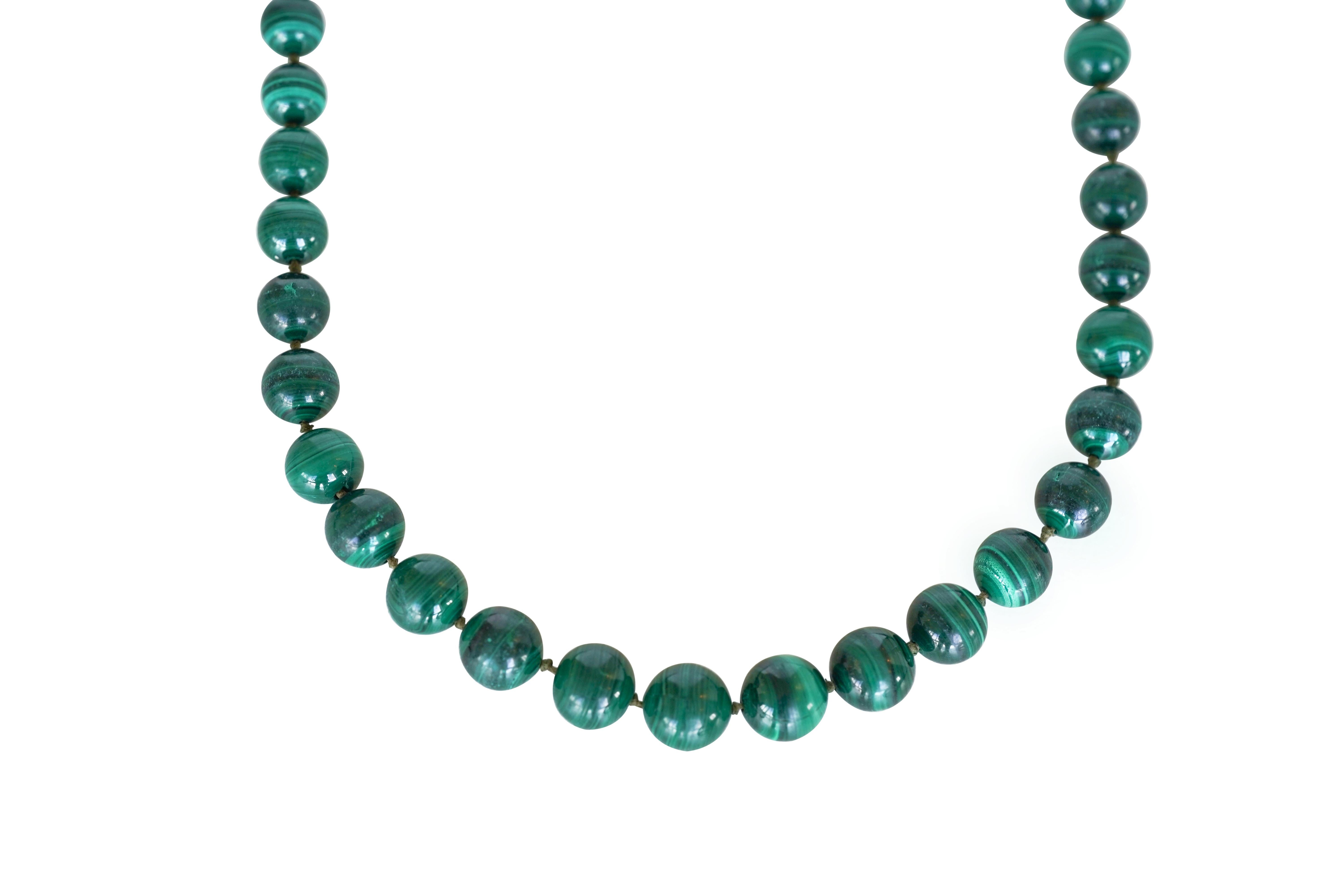 Natural Nearly Round Malachite Beaded Necklace
46 natural near-round malachite stones strung together by nylon thread.
Malachite maximum size: 13.65 mm.
Malachite minimum size: 7.31 mm.
Number of total malachite stones: 46.
Total weight: 146