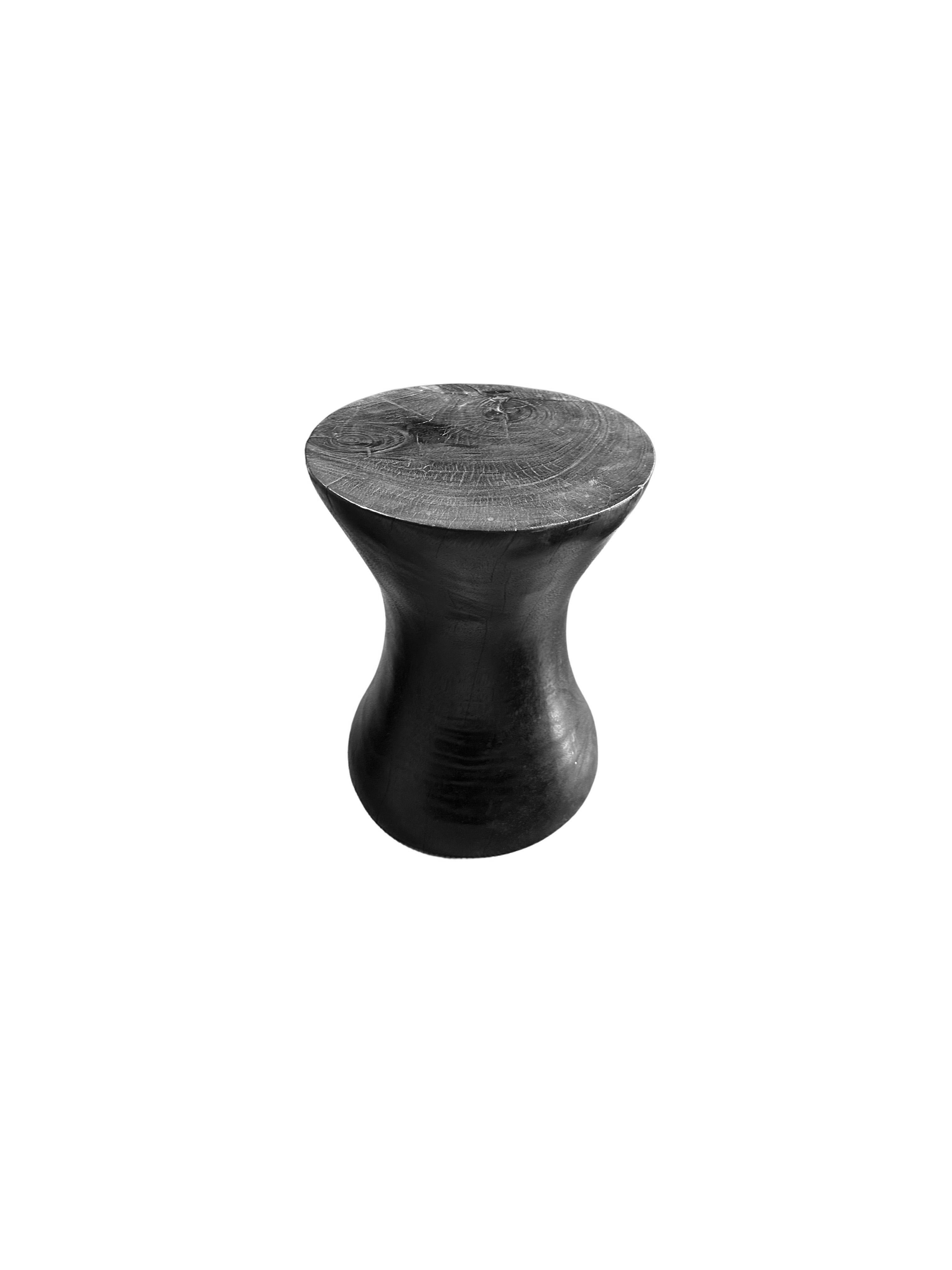 Indonesian Round Mango Wood Side Table, Burnt Finish, Carved Detailing, Modern Organic For Sale