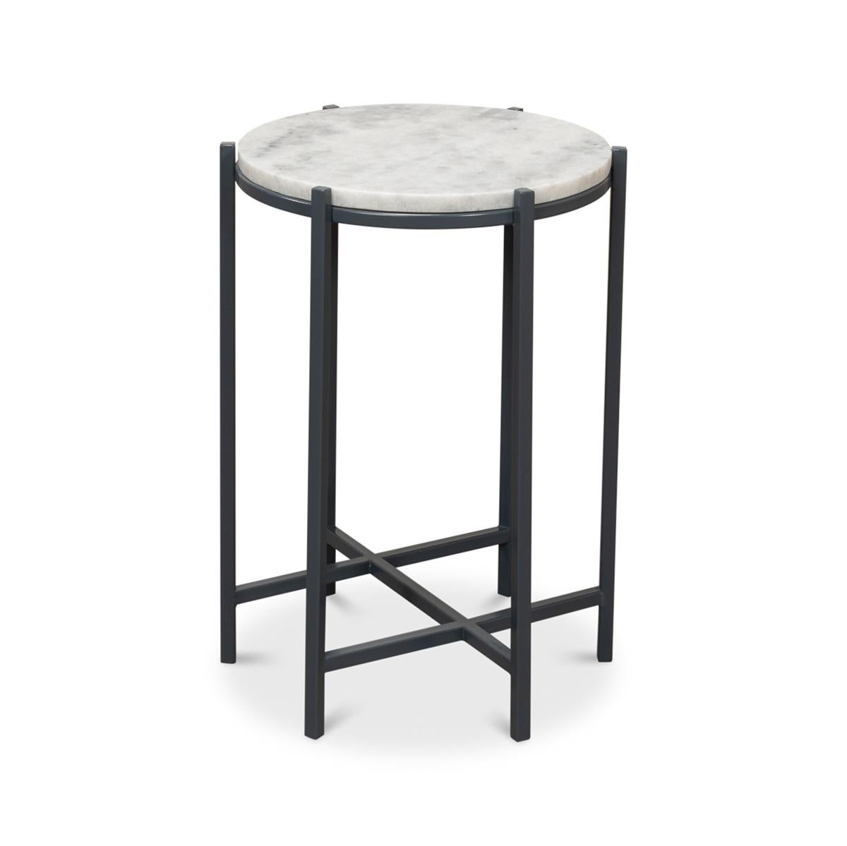 Modern round marble six-legged accent table, with an inset white marble top, above a painted iron six-legged base with a stretcher.

Dimensions: 16