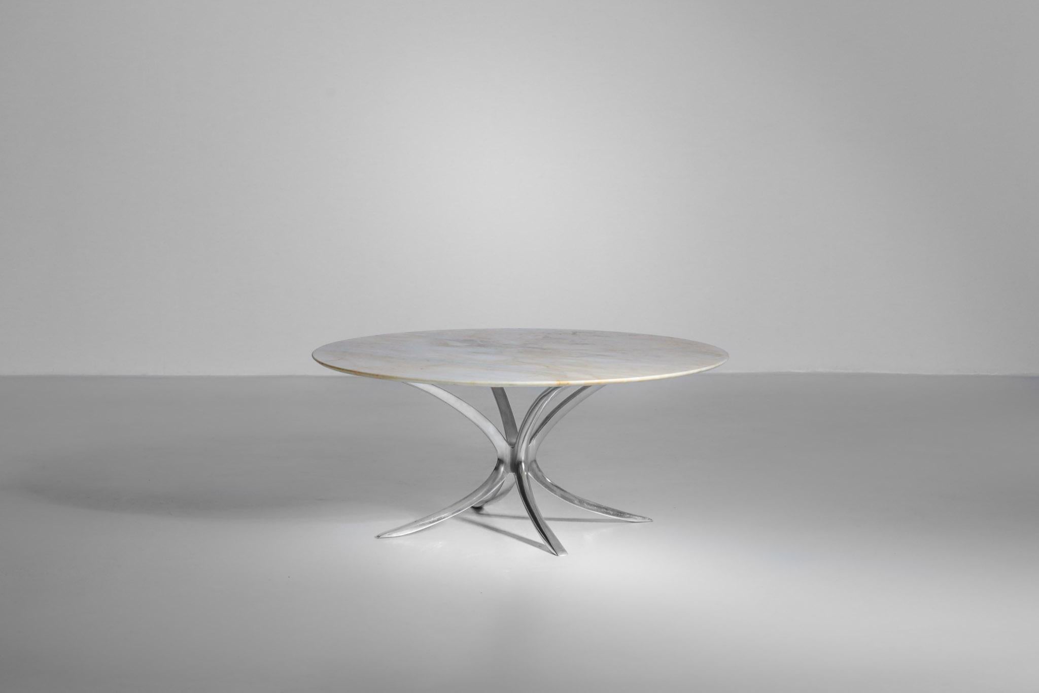 Nice coffee table made of marble and stainless steel from 1960s.
 