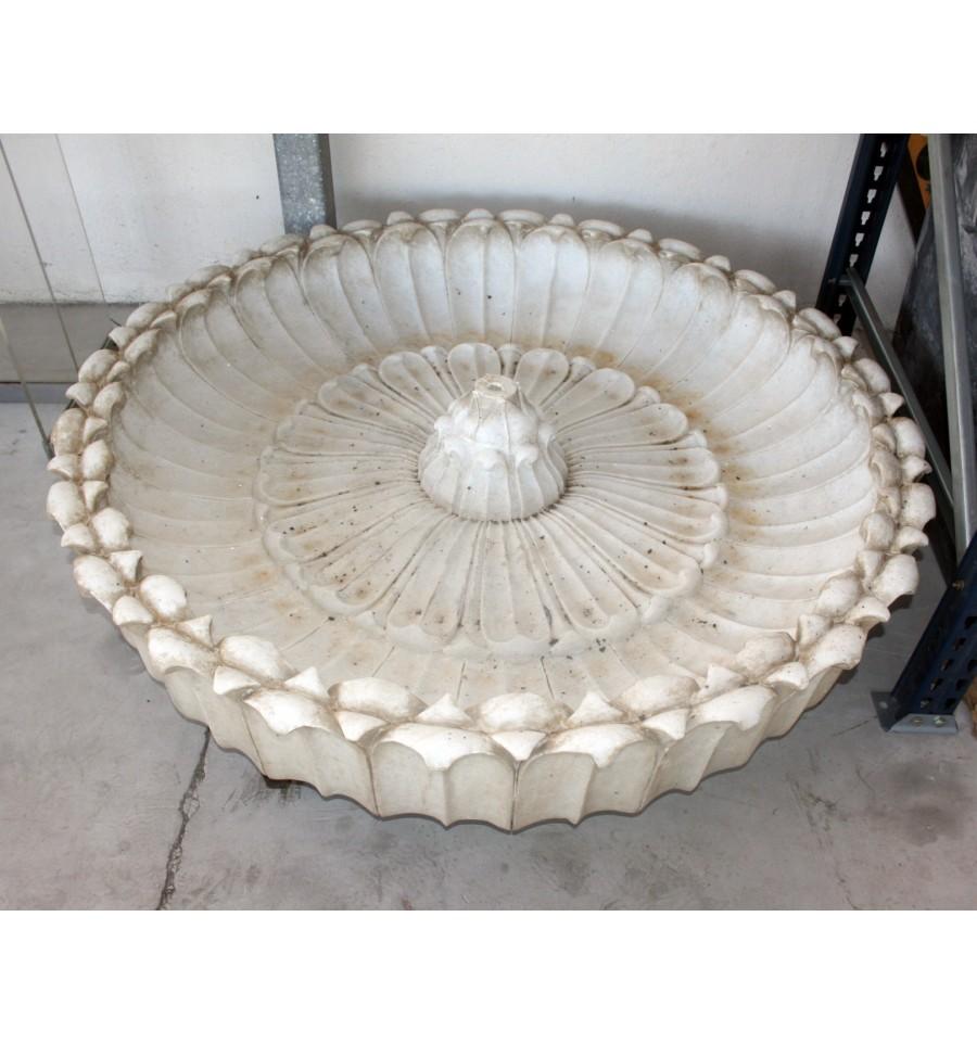 Round marble hand-carved one piece floor fountain.