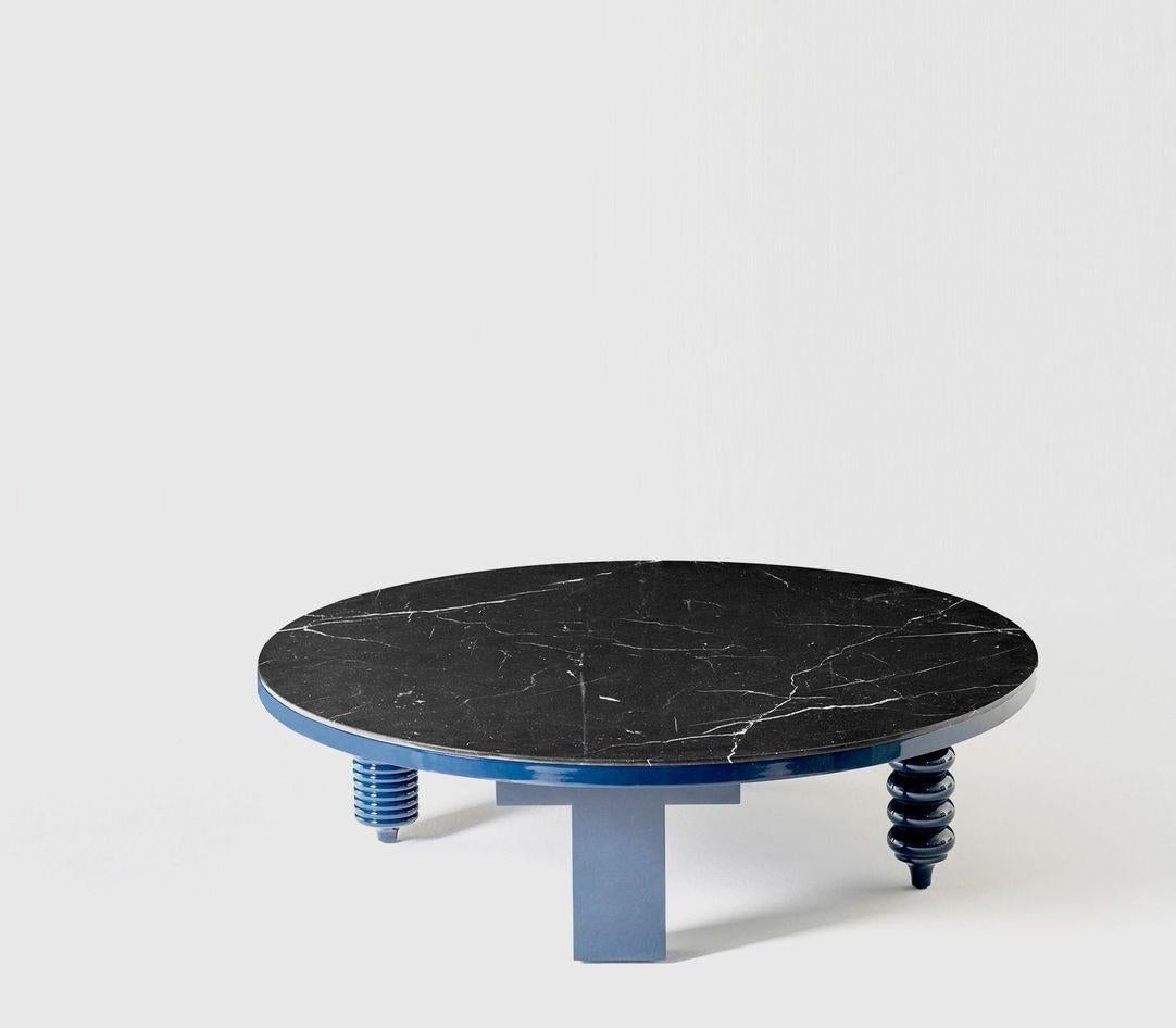 Round marble multileg low table by Jaime Hayon
Dimensions: Diameter 120 x H 35 cm 
Materials: MDF base and legs in turned solid alder wood, lacquered in white gloss RAL 9016 or blue RAL 5011. Marble tabletops in White Carrara Venato or Black