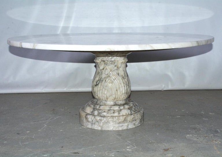 Vintage circular marble coffee table with carved base. Marble table, coffee table, drinks table.