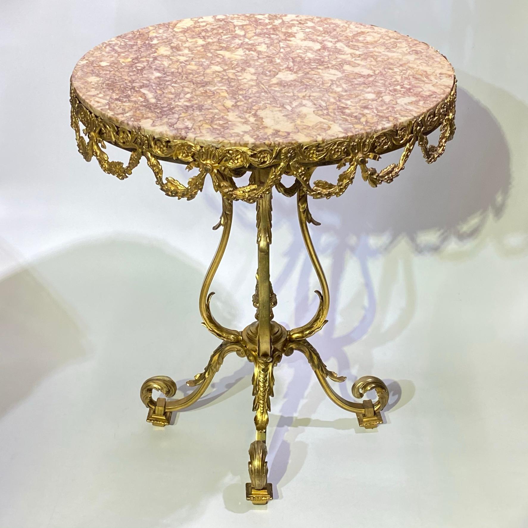 Very nice quality mid century French round marble top Louis XVI style bronze side table.