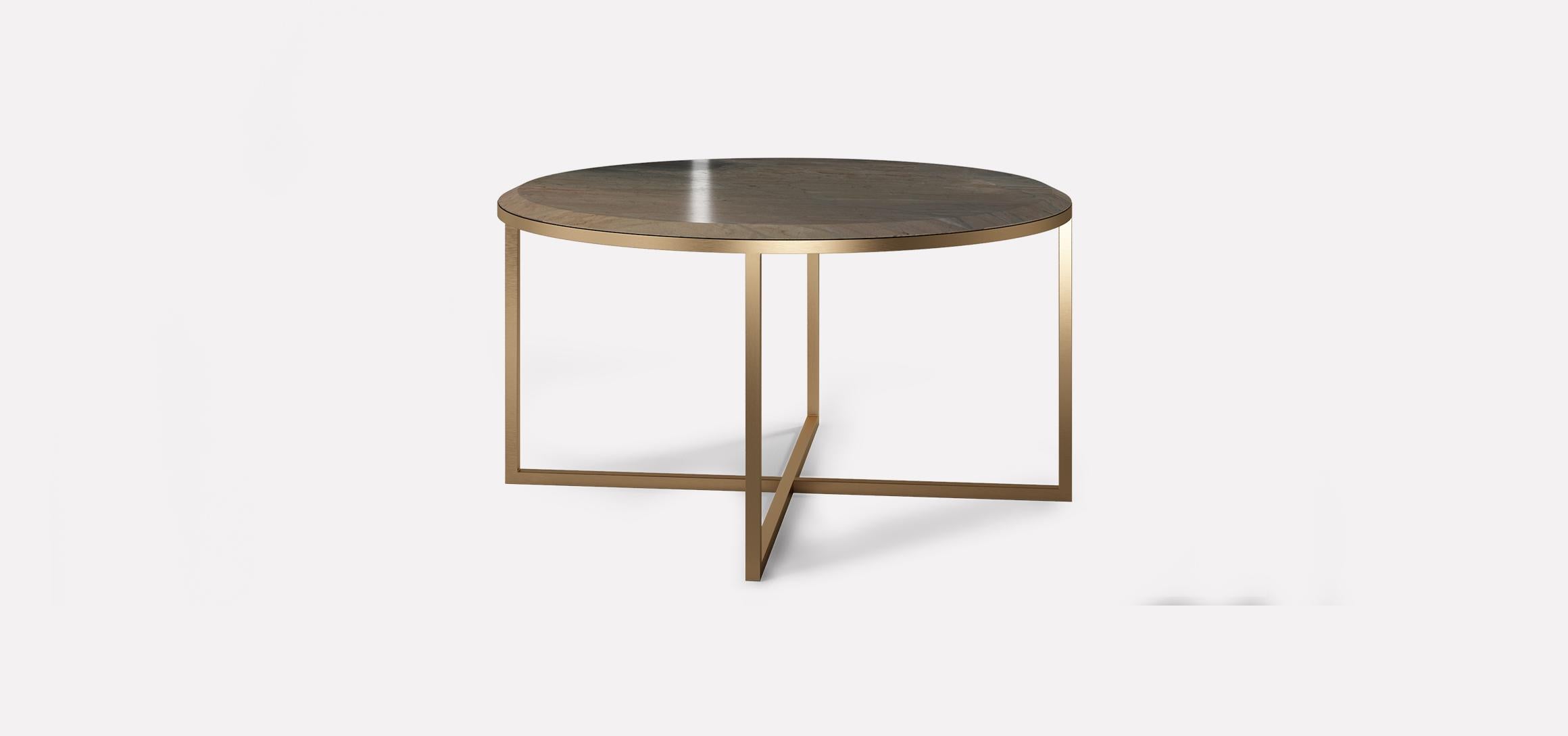 HOPE Royal is a coffee table with a round-shaped top and metal crossed base. The top is a precious marble perfectly beveled and carved, letting the beauty of material being the design protagonist of this piece.

As shown marble: elegant brown