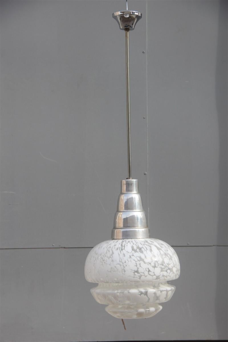 Round midcentury Italian design chandelier aluminum Murano white glass, 1960
Only glass height cm.30, diameter cm.32.
1 light bulb E27 max 80 Watt.