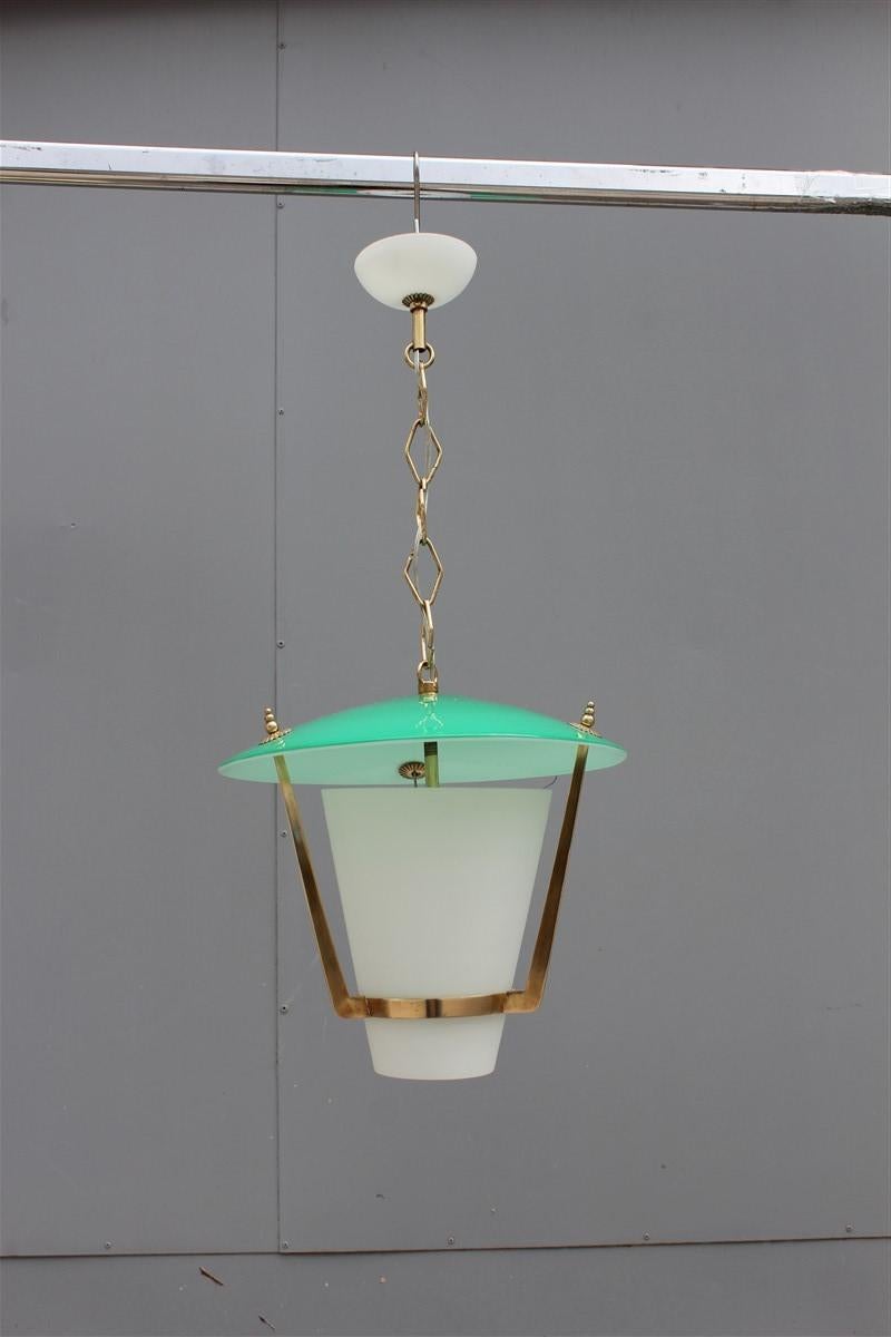 Round midcentury Italian design lantern green gold brass glass white.
1 light bulb E27 max 100 watt.