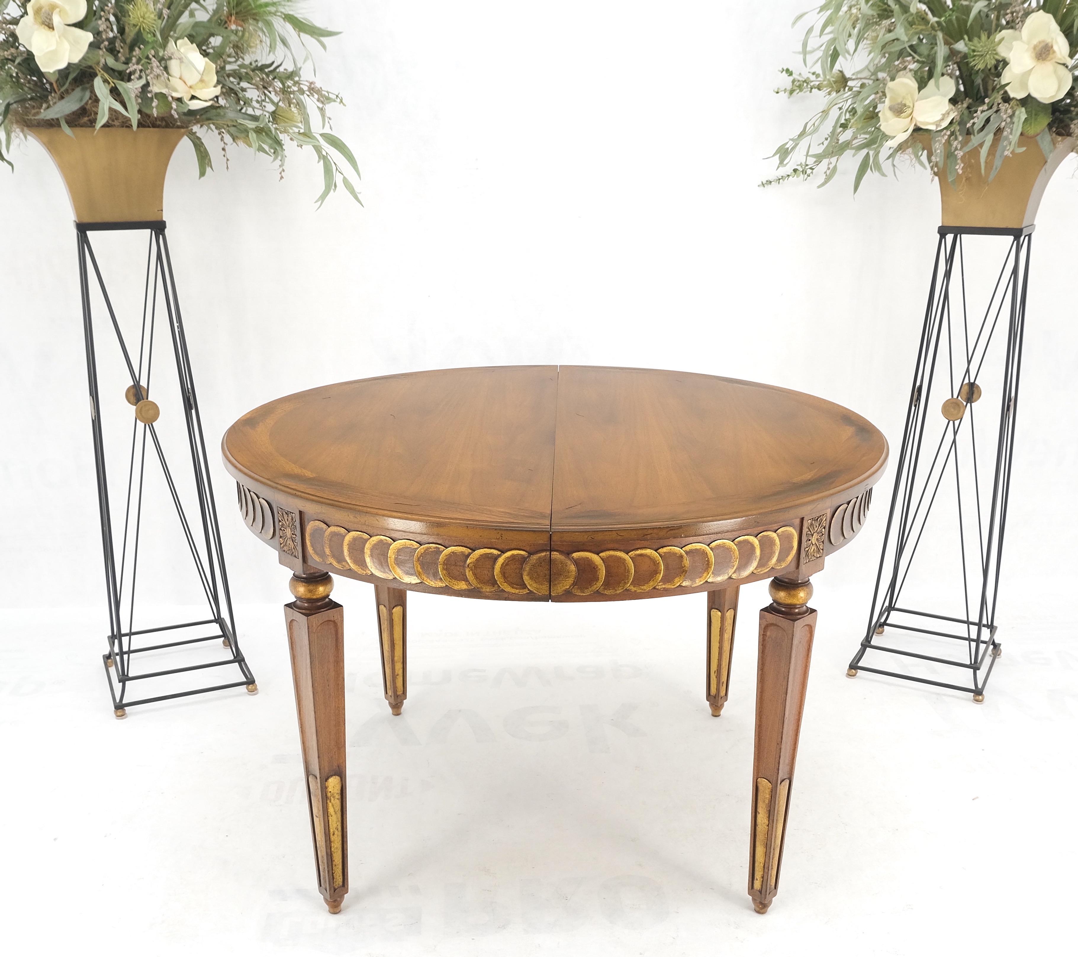 Round Mid-Century Modern Three Leaves Distressed Walnut Dining Table MINT!
Gold leaf overlapping decorated circular design skirt. 

Three leaves, each measuring 18 inches across
total table length equals 98 inches wide.