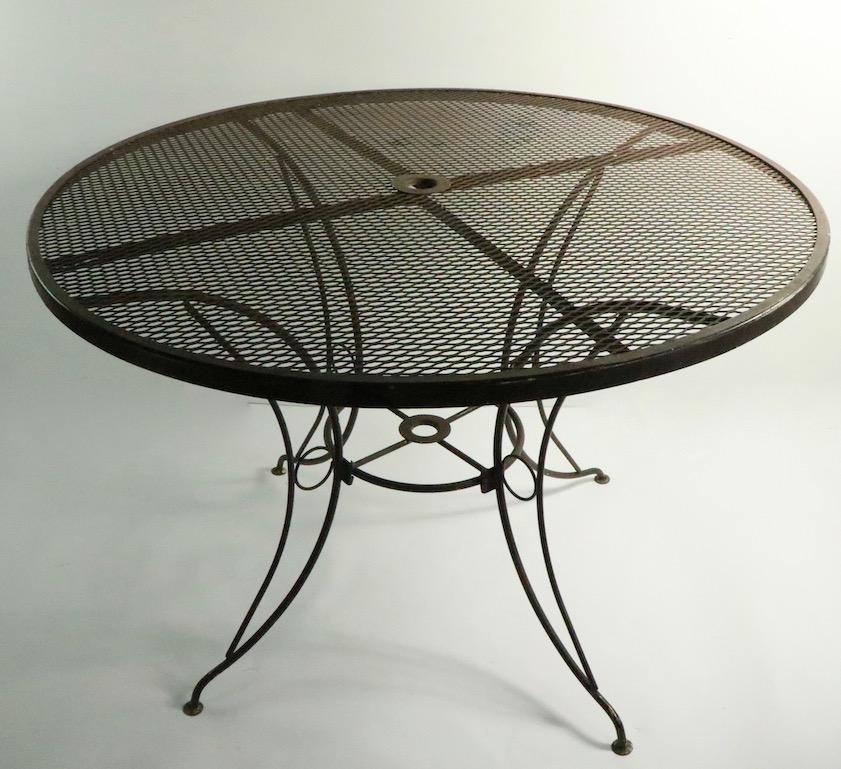 Wrought Iron Round Mid Century Patio Garden Table Attributed to Woodard For Sale