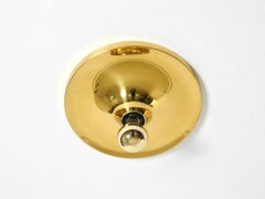 Round Mid Century Space Age disc brass ceiling or wall lamp by Sölken Leuchten