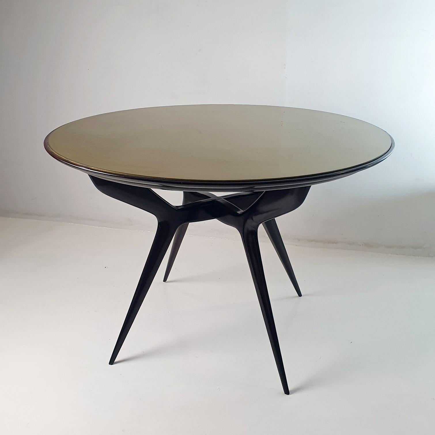 Table de salle à manger ronde à pattes d'araignée du milieu du siècle dernier Bon état - En vente à Albano Laziale, Rome/Lazio
