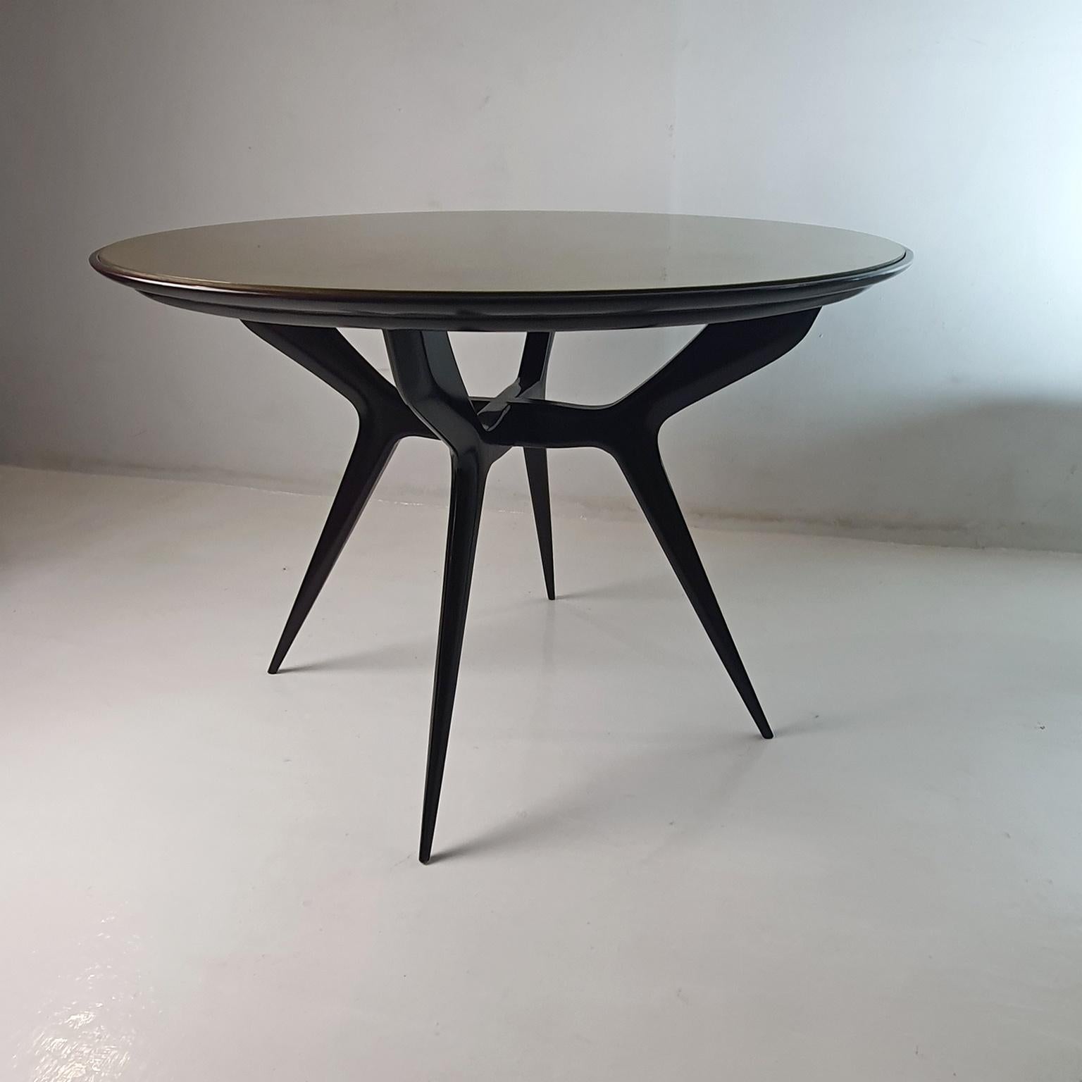 Table de salle à manger ronde à pattes d'araignée du milieu du siècle dernier en vente 2