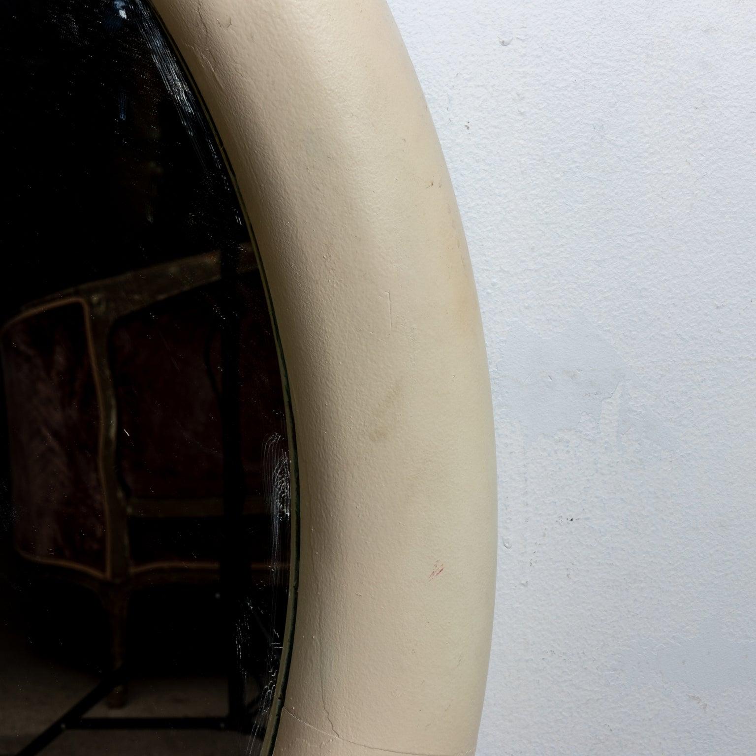 Round Bull Nose framed mirror with off-white painted finish in the style of Karl Springer. Made in USA. Please note wear consistent with age.
 
