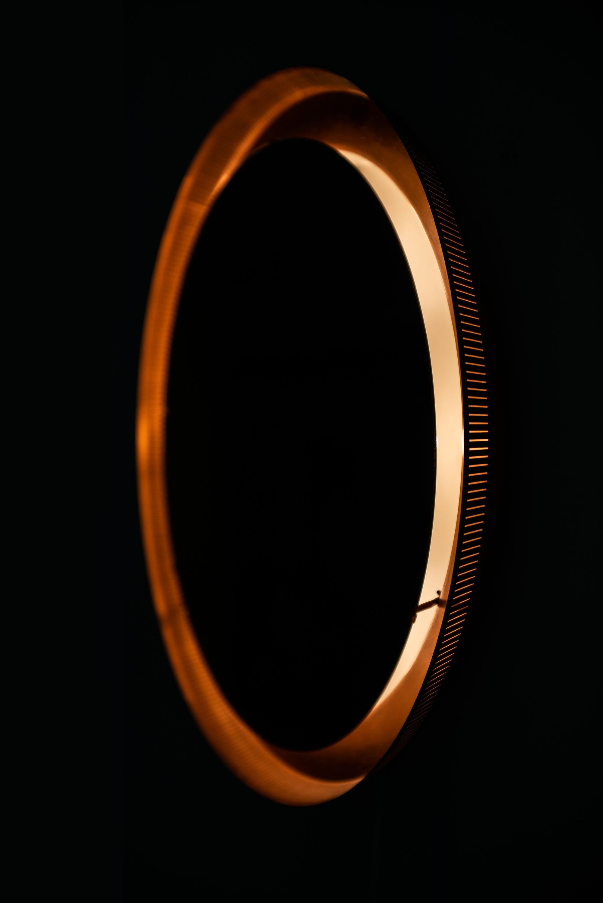 Scandinavian Modern Round Mirror in Copper with Backlight Produced in Denmark For Sale