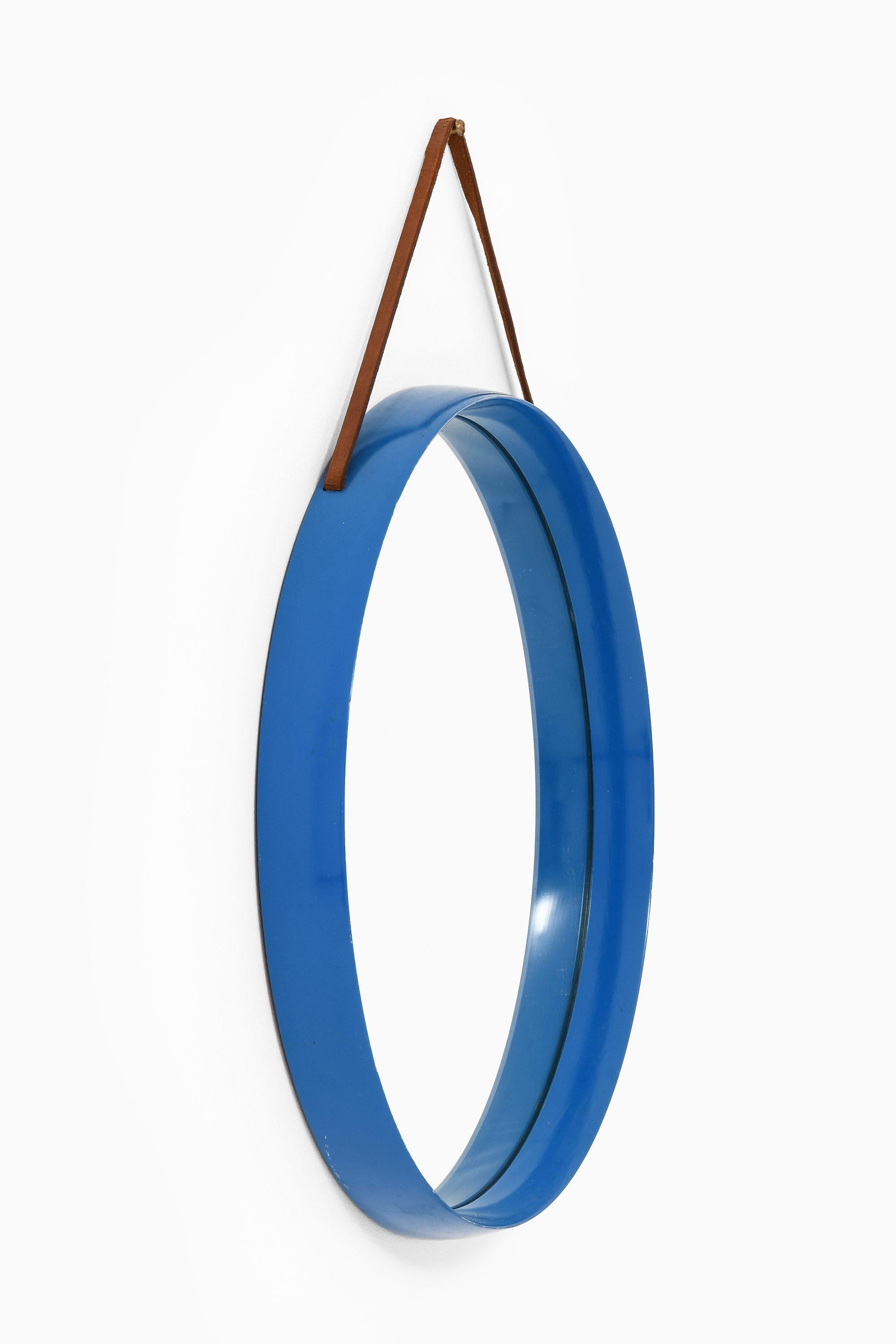 Round Mirror in Blue Lacuqered Wood and Leather by Uno and Östen Kristiansson, 1950's

Additional Information:
Material: Blue lacuqered wood and leather
Style: Mid century, Scandinavian
Produced by Luxus in Vittsjö, Sweden
Dimensions (W x D x H): 45