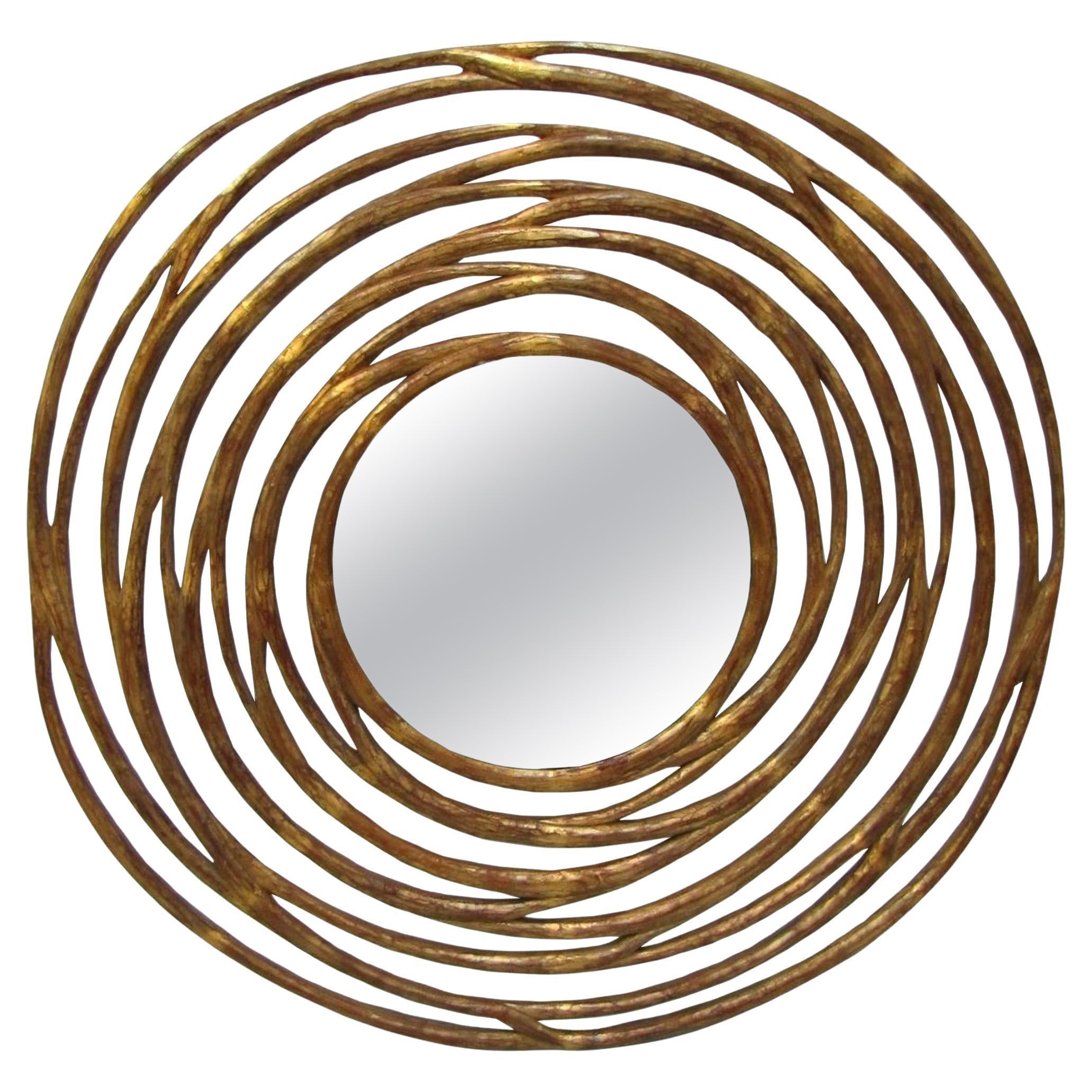 Round mirror with carved and gilded frame, Christopher Guy, Singapore circa 2000 in vendita