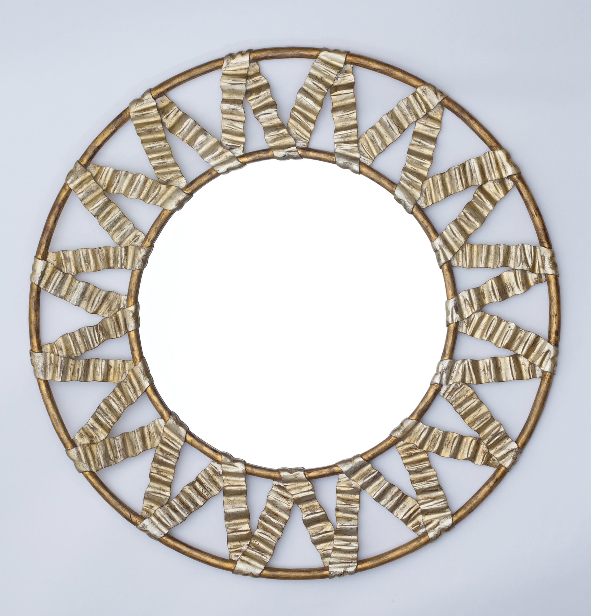 Large round mirror in a frame depicting two gilded wood hoops with interlacing silvered wood ribbons.
Diameter: 136 cm (53.5 inches)
Thickness: About 3 cm (1.2 inches)

Story

Christopher Guy, France (1960-2020)

British luxury furniture designer,