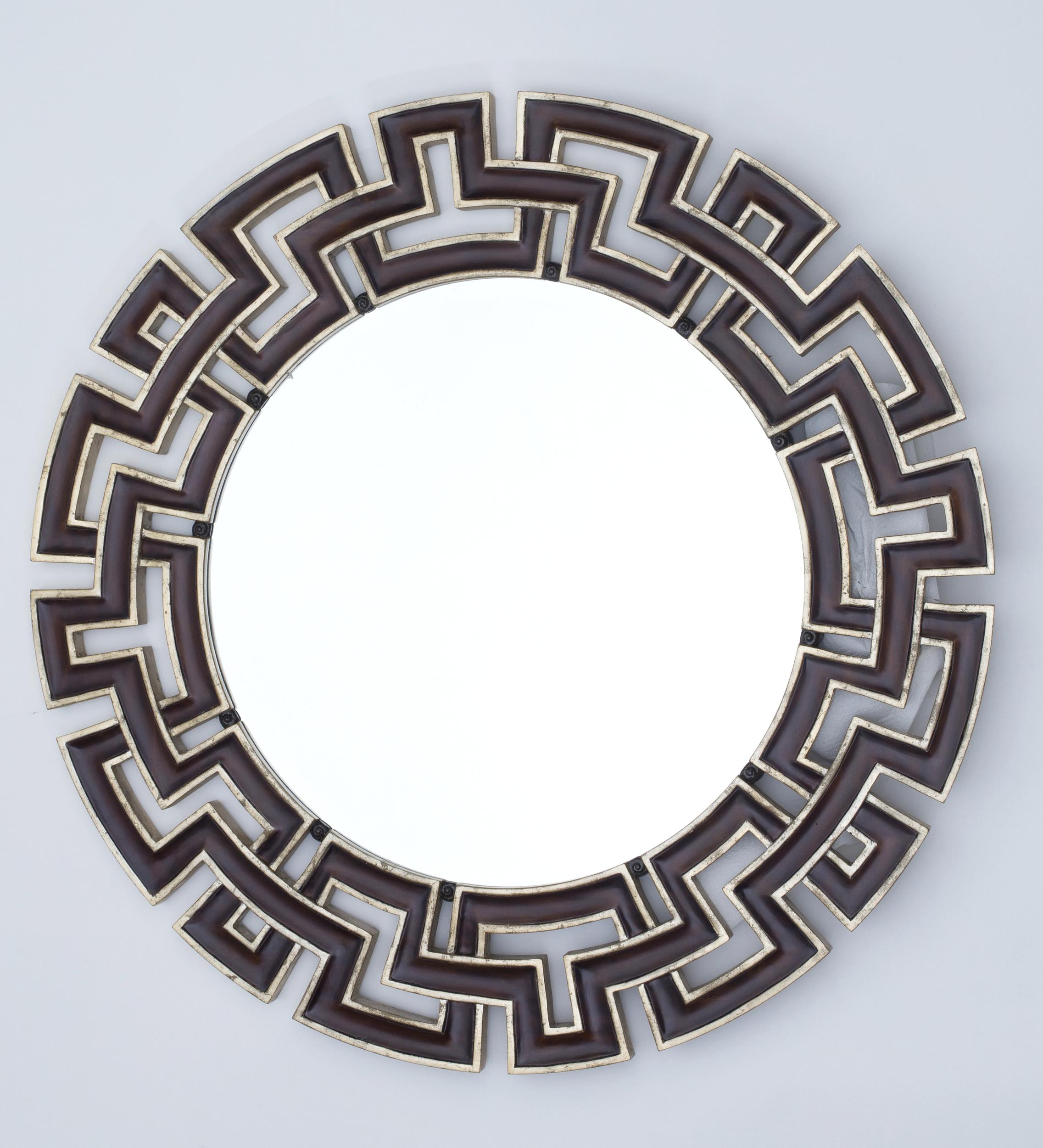 Round mirror in a carved wood frame decorated with a double Greek motif, finished with brown lacquer and silver leaf.
Diameter: 109.5 cm (43.11 inches)
Thickness: 3 cm (1.2 inches)

Story

Christopher Guy, France (1960-2020)

British luxury