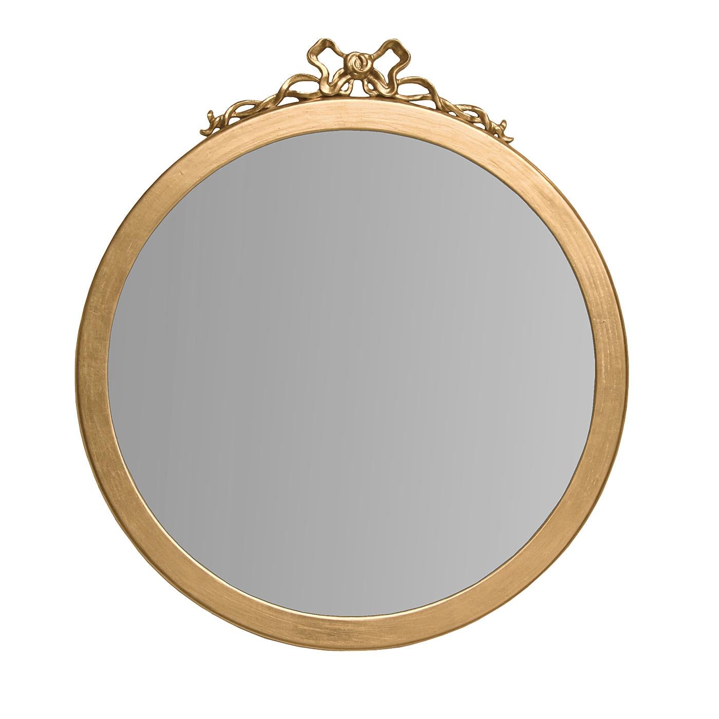 This round mirror will be an exquisite addition to a classically decorated home. Either in a powder room, in an entryway, or to brighten up a wall in the living room, this piece of functional decor is a magnificent example of masterful craftsmanship