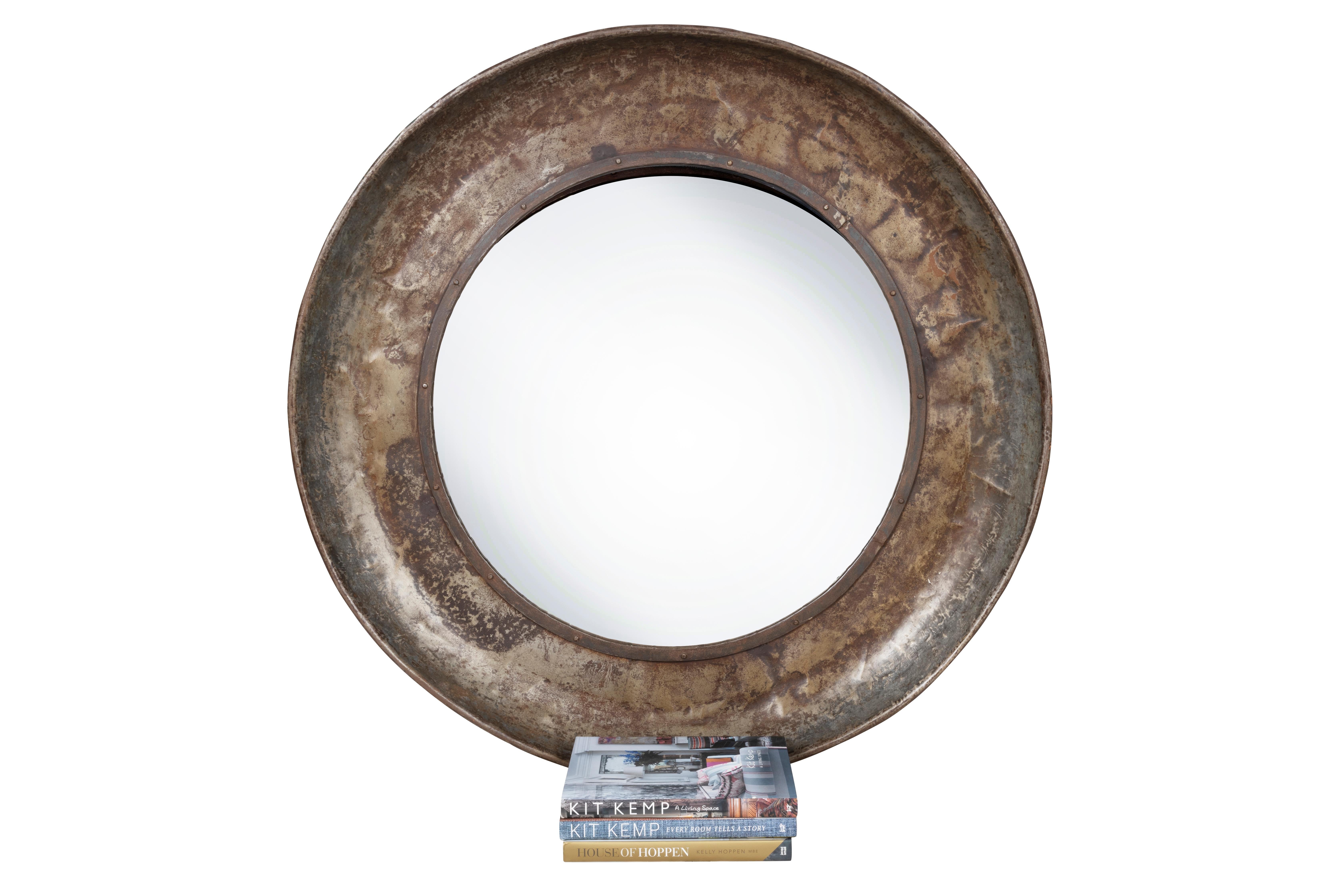 Large circular mirror with metal convex metal frame. 

This piece is a part of our one-of-a-kind collection, Le Monde. Exclusive to us. 

Globally curated by Brendan Bass, Le Monde furniture and accessories offer modern sensibility, provincial