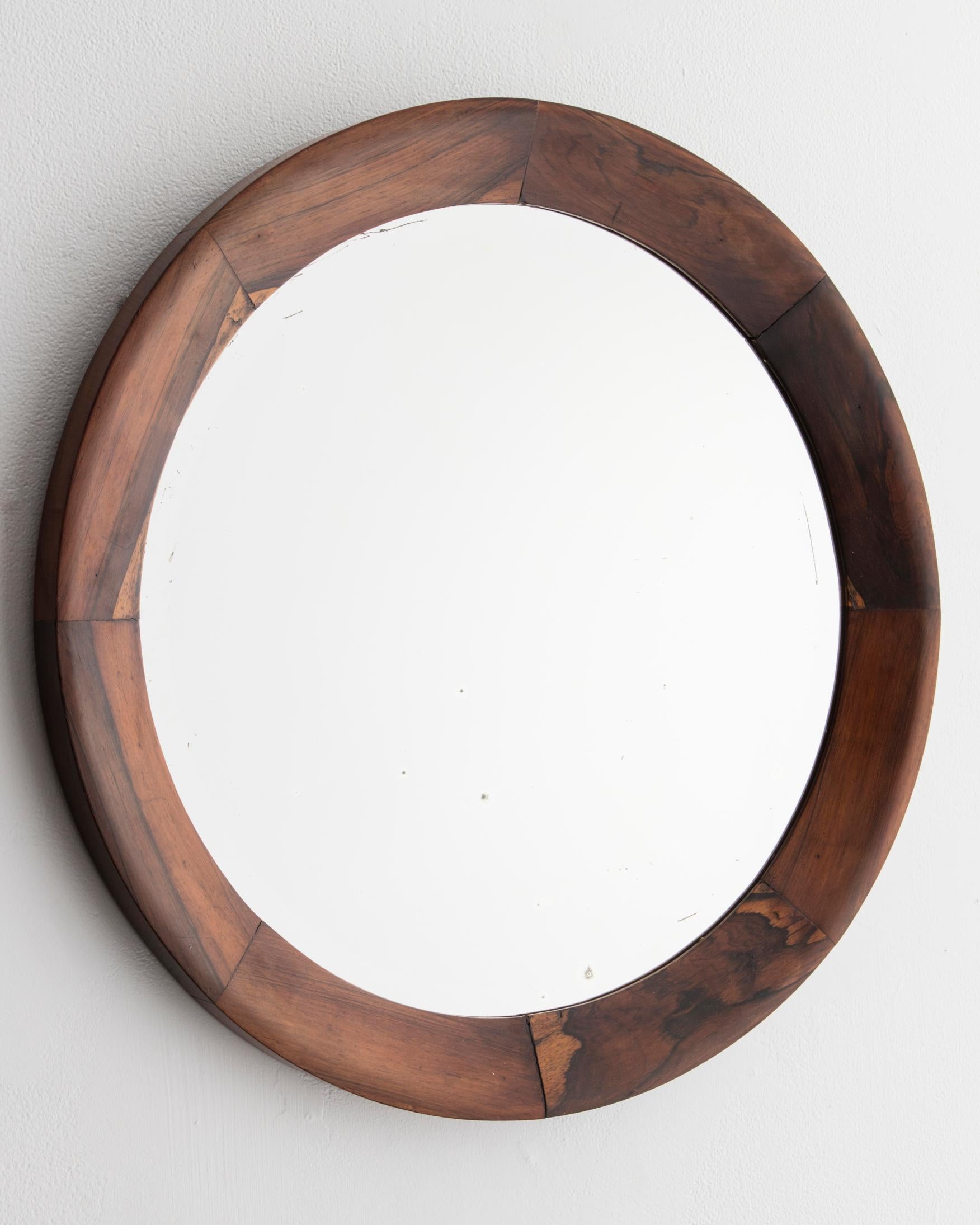 Round mirror with rosewood frame, Brazil, 1960s.
 