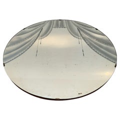 Round mirror with silkscreen decoration, 1950s