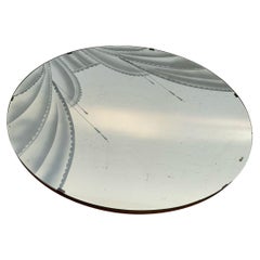 Round mirror with silkscreen decoration, 1950s