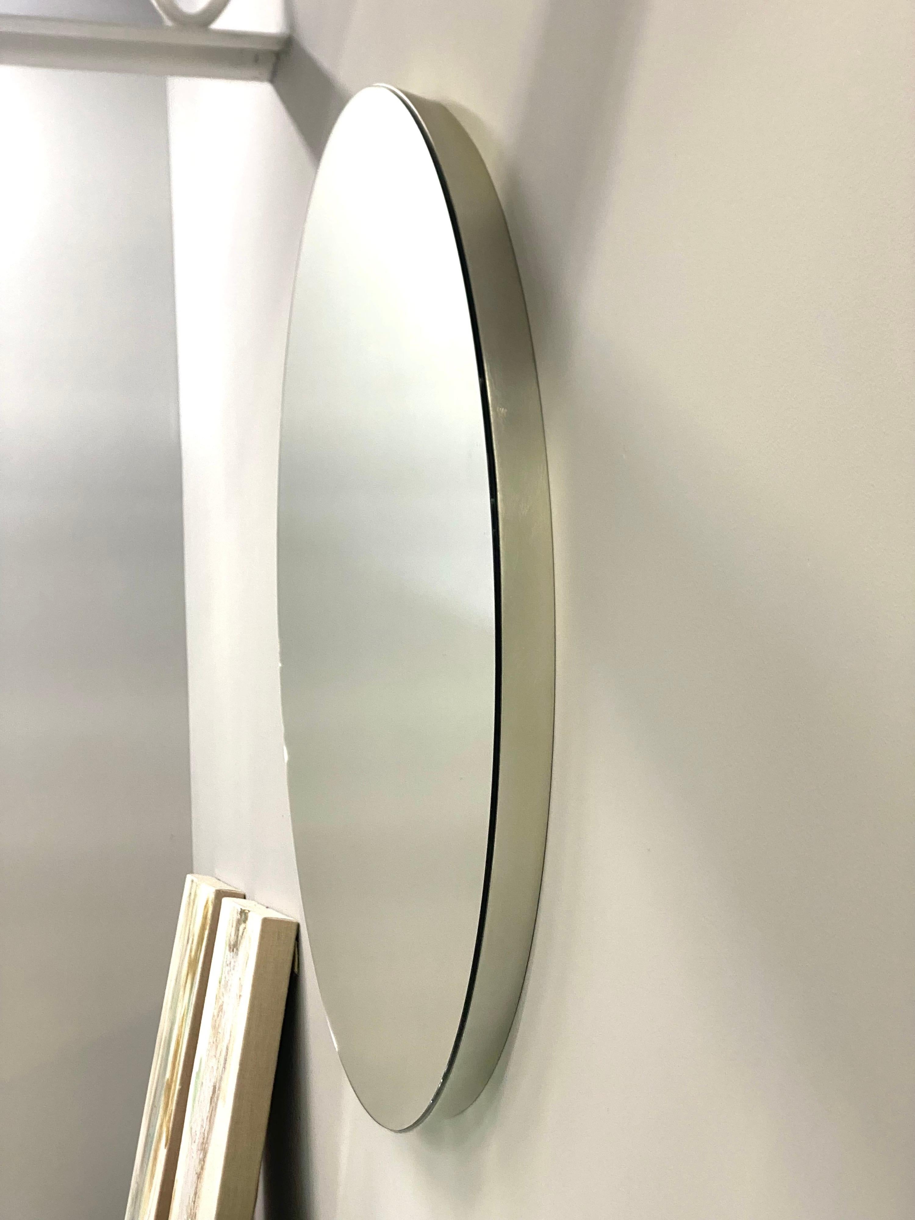 silver frame round mirror