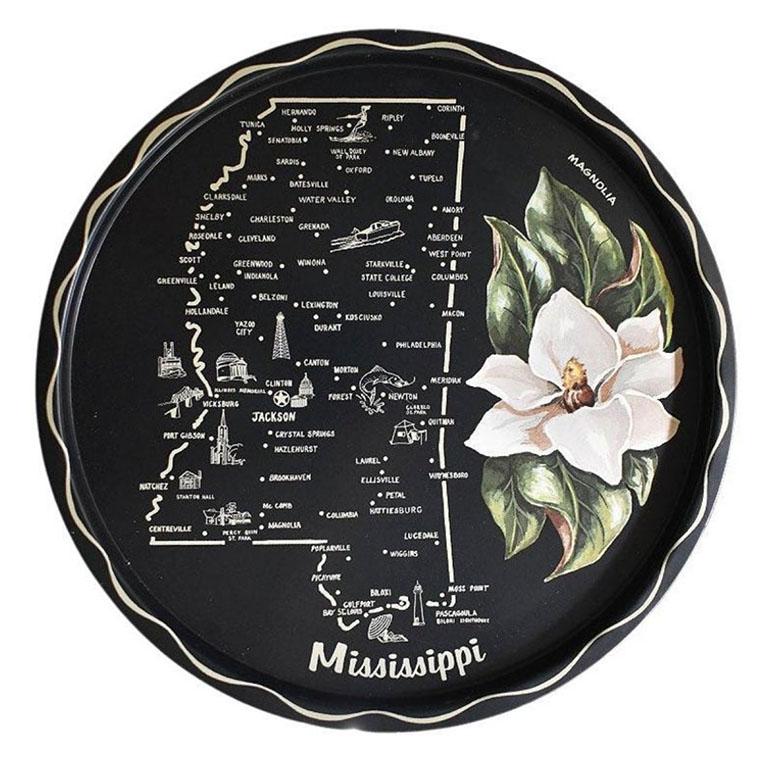 A very southern style metal serving tray decorated with a magnolia flower and the outline of Mississippi with its towns. 

Dimensions:
11