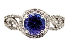 Round Mixed Cut Tanzanite and Diamond Halo Solitaire Band Ring in 18 Karat Gold