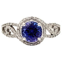 Round Mixed Cut Tanzanite and Diamond Halo Solitaire Band Ring in 18 Karat Gold