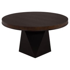 Table de salle à manger ronde moderne en chêne avec base géométrique noire