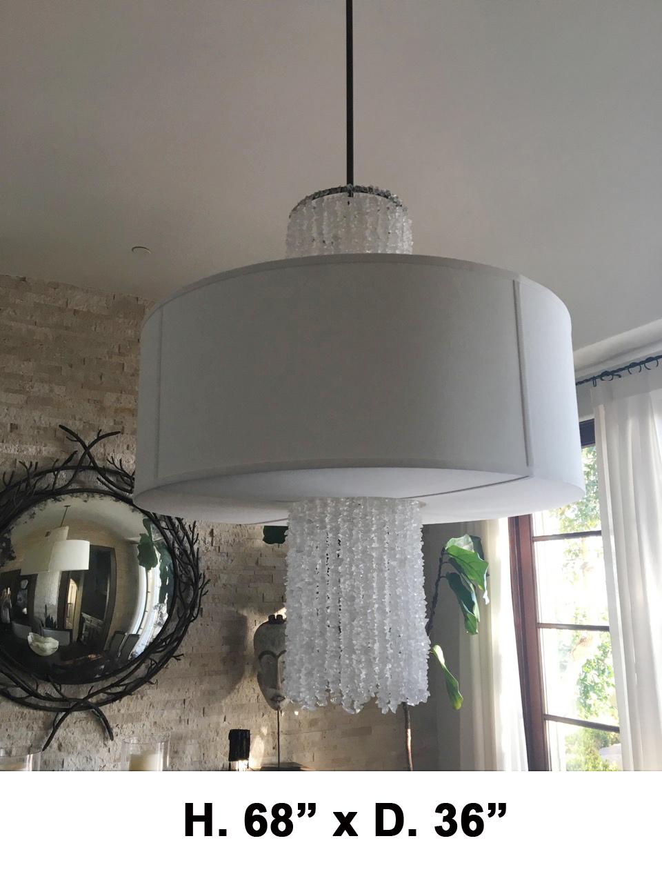 Lovely Round Modern style Rock Crystal 8 light Chandelier, with rock crystal strand enhancement in the water fall motif.
Shade is included
in excellent condition