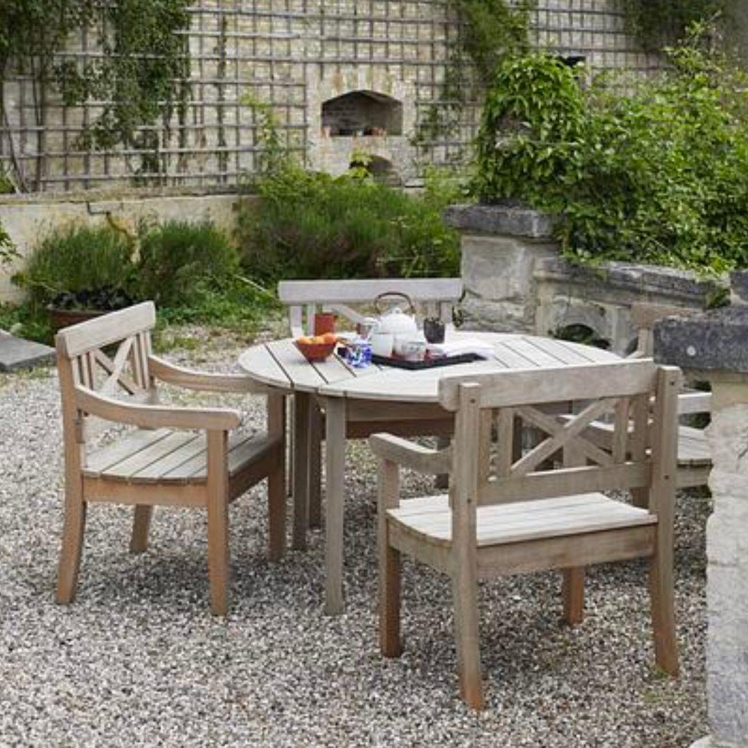 Round Mogens Holmriis outdoor 'Drachmann 126' teak table for Skagerak

Skagerak was founded in 1976 by Jesper and Vibeke Panduro, who took inspiration from their love of Scandinavian design and its rich tradition. The brand emphasizes