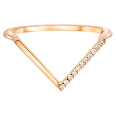 Round moissanite Chevron 14k gold ring.