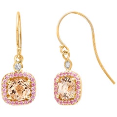 Orecchini a cerchio tondi con morganite e diamanti in oro giallo