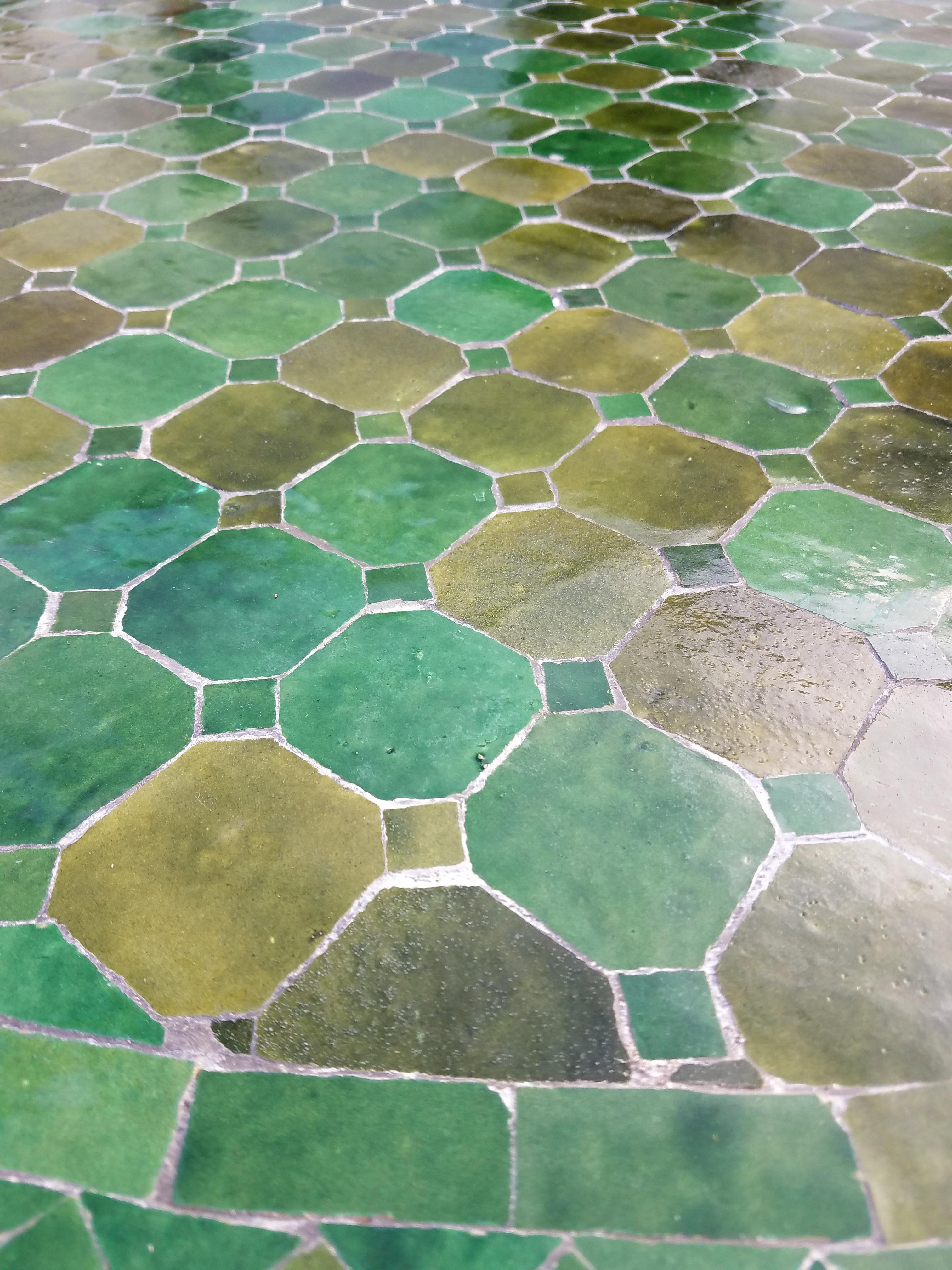 Custom made glazed Moroccan mosaic table measuring 48