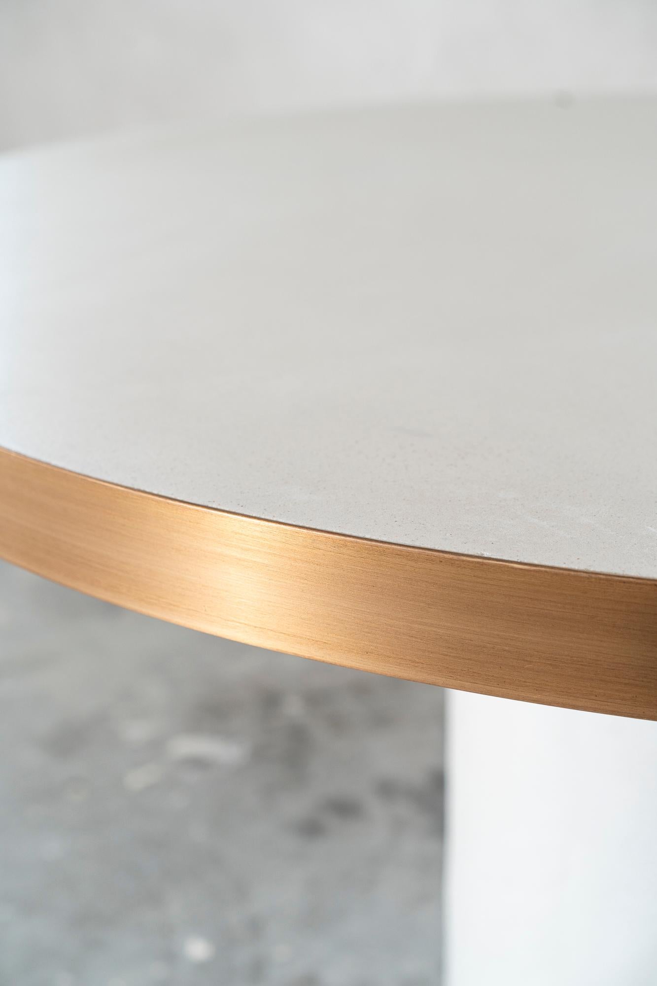 Polished Round Mortex Table with Brass RIng and Signature Detail For Sale