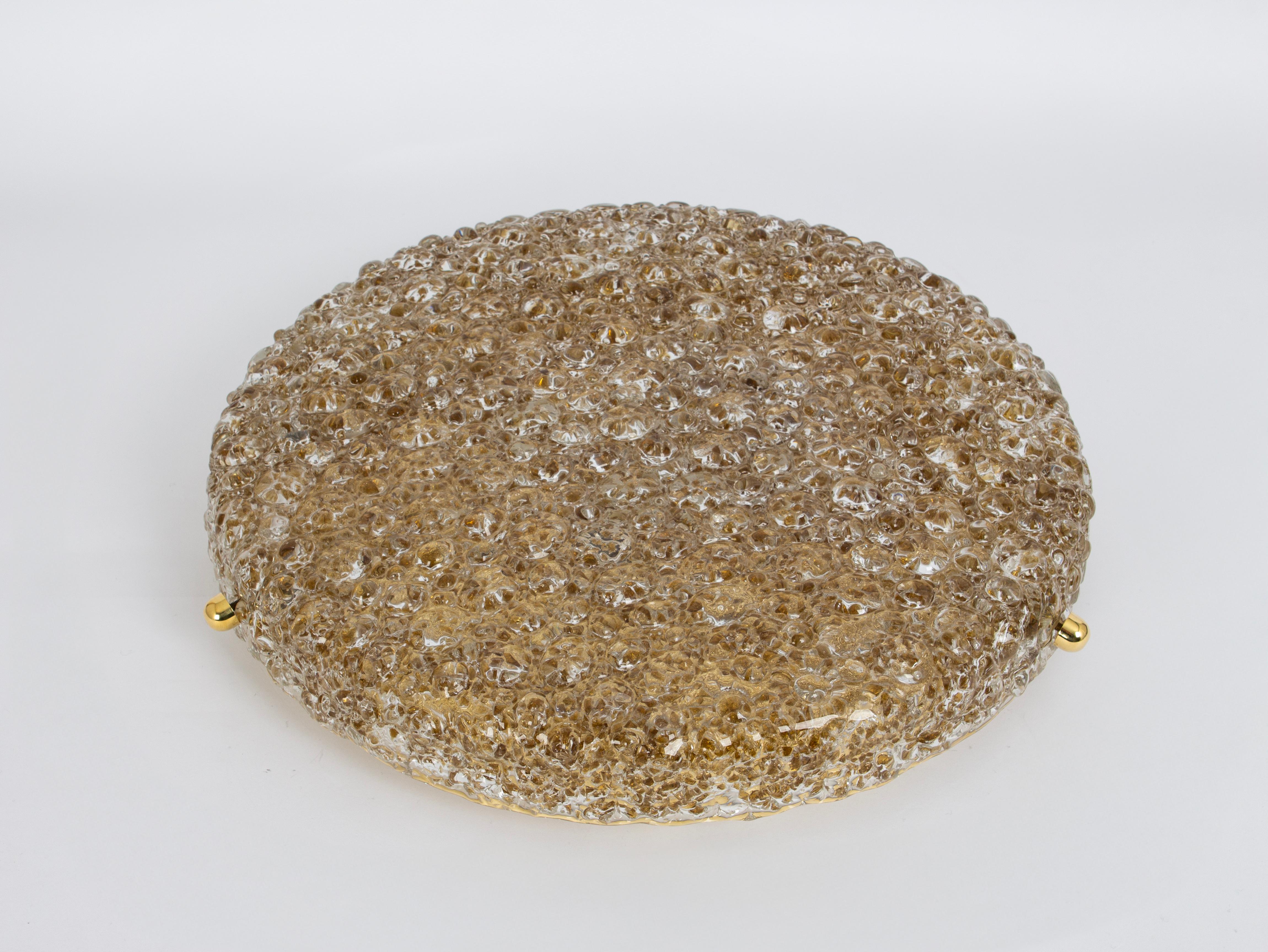 A wonderful round Murano Flush Mount by Hillebrand Leuchten, Germany, 1970s.
Thick textured Murano fixture on a brass base with 3 brass screws.

High quality and in very good condition. Cleaned and well-wired.

The fixture requires 4 x E14 small